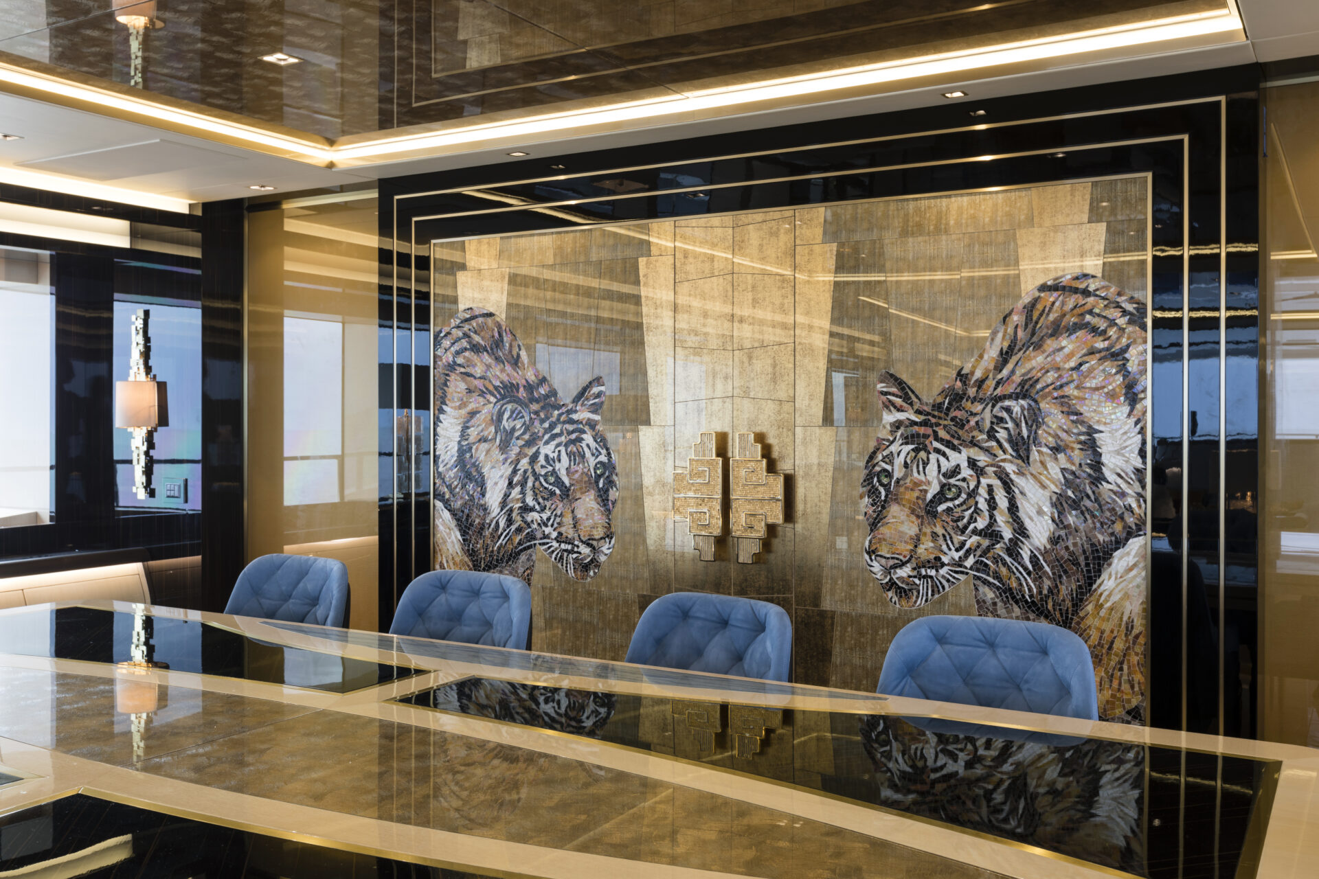 Luxury yacht dining room with tiger mosaic walls.