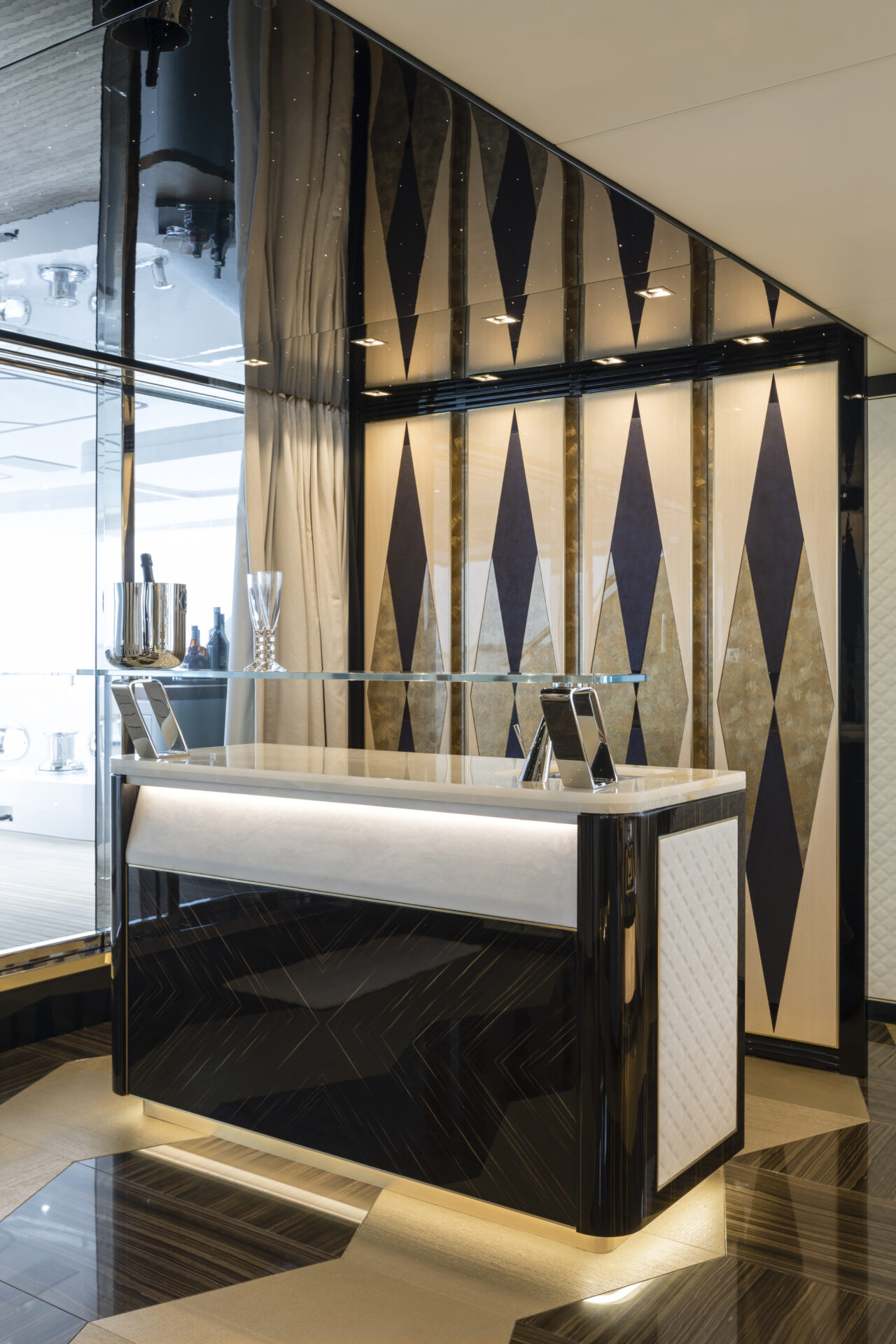 Luxury yacht interior bar with geometric design.