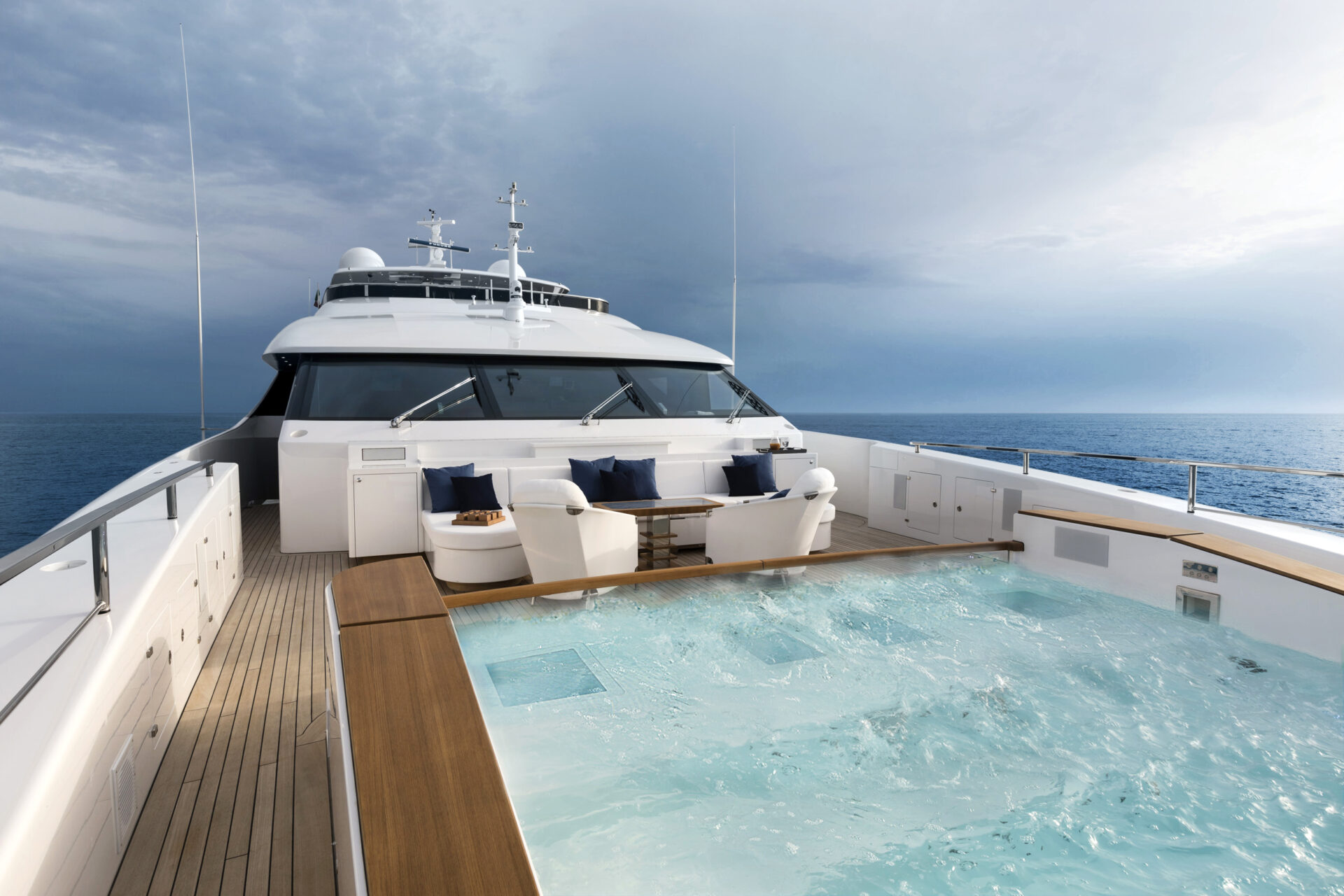 Luxury yacht deck with jacuzzi and ocean view