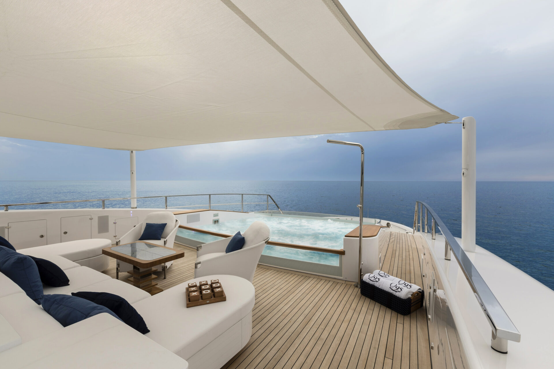 Luxurious yacht deck with jacuzzi and ocean view