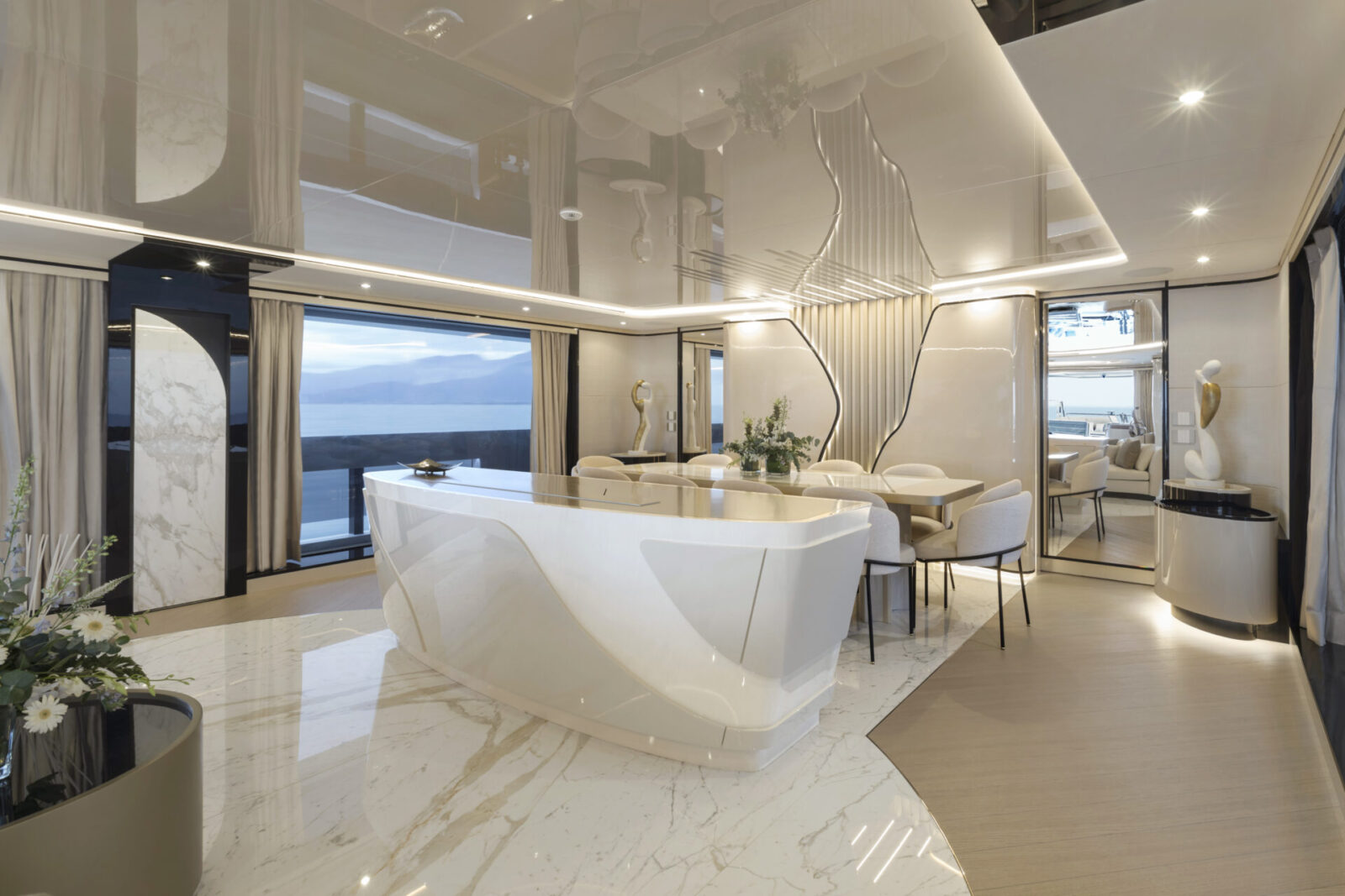 Luxurious interior of a Mangusta yacht dining area.