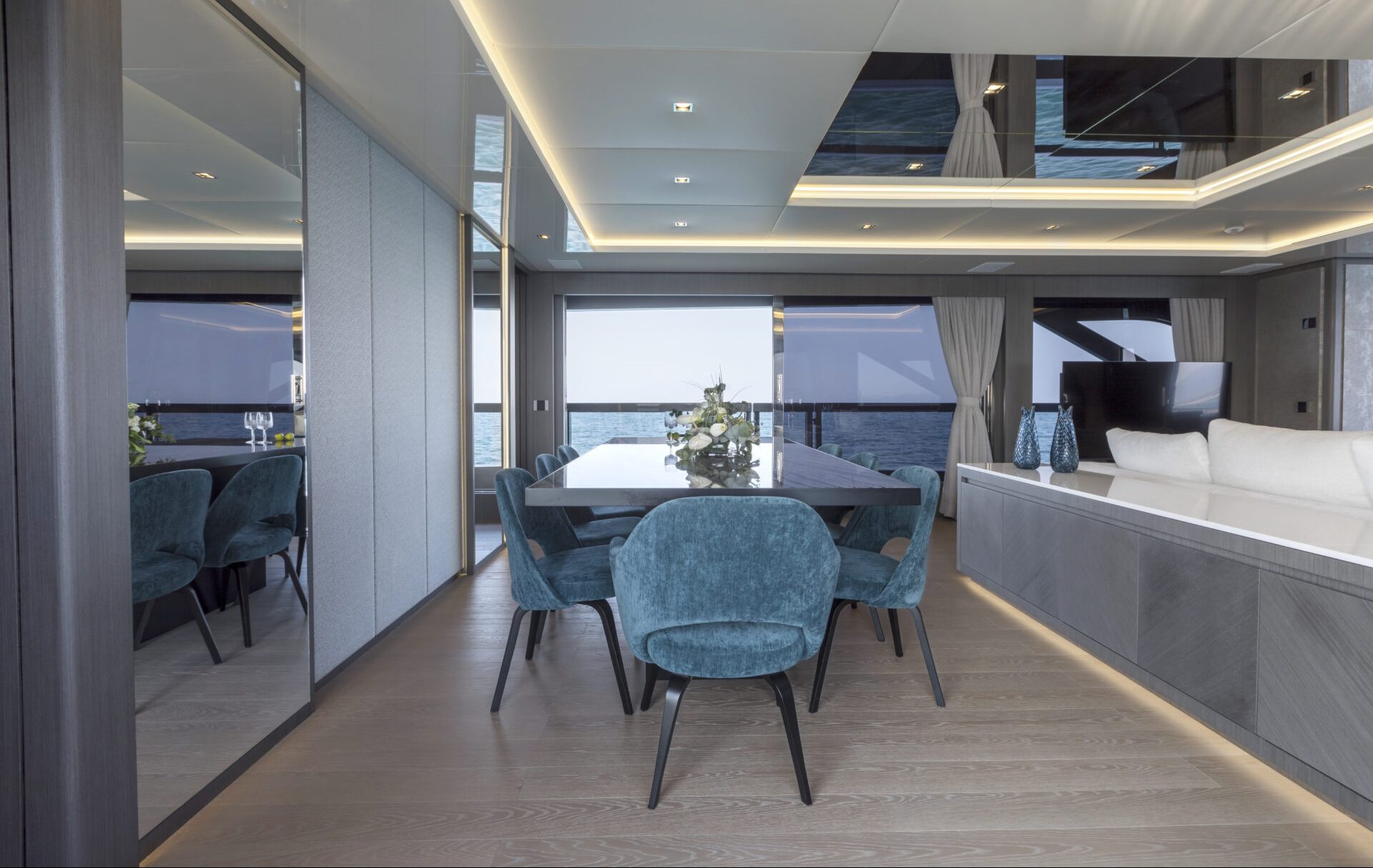 Luxury dining room on Mangusta yacht with sea view