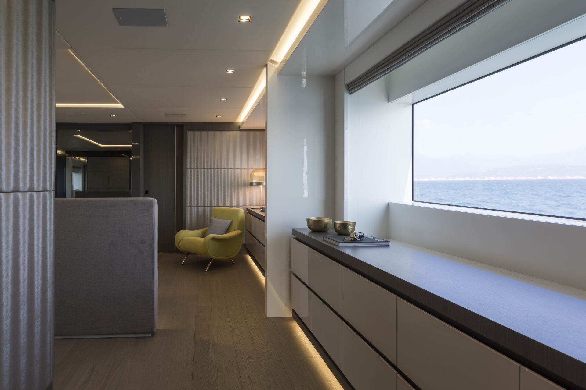 Luxurious yacht interior, ocean view window.
