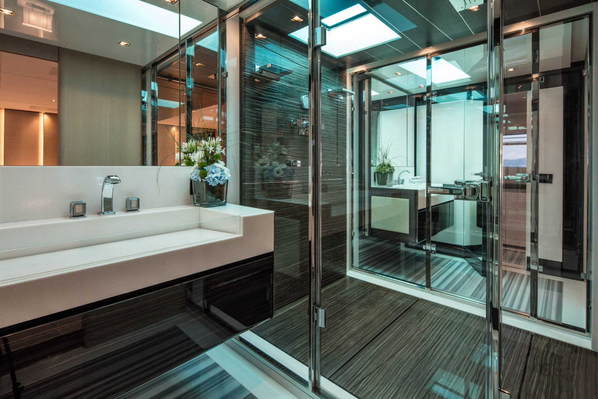 Luxurious yacht bathroom with sleek glass shower