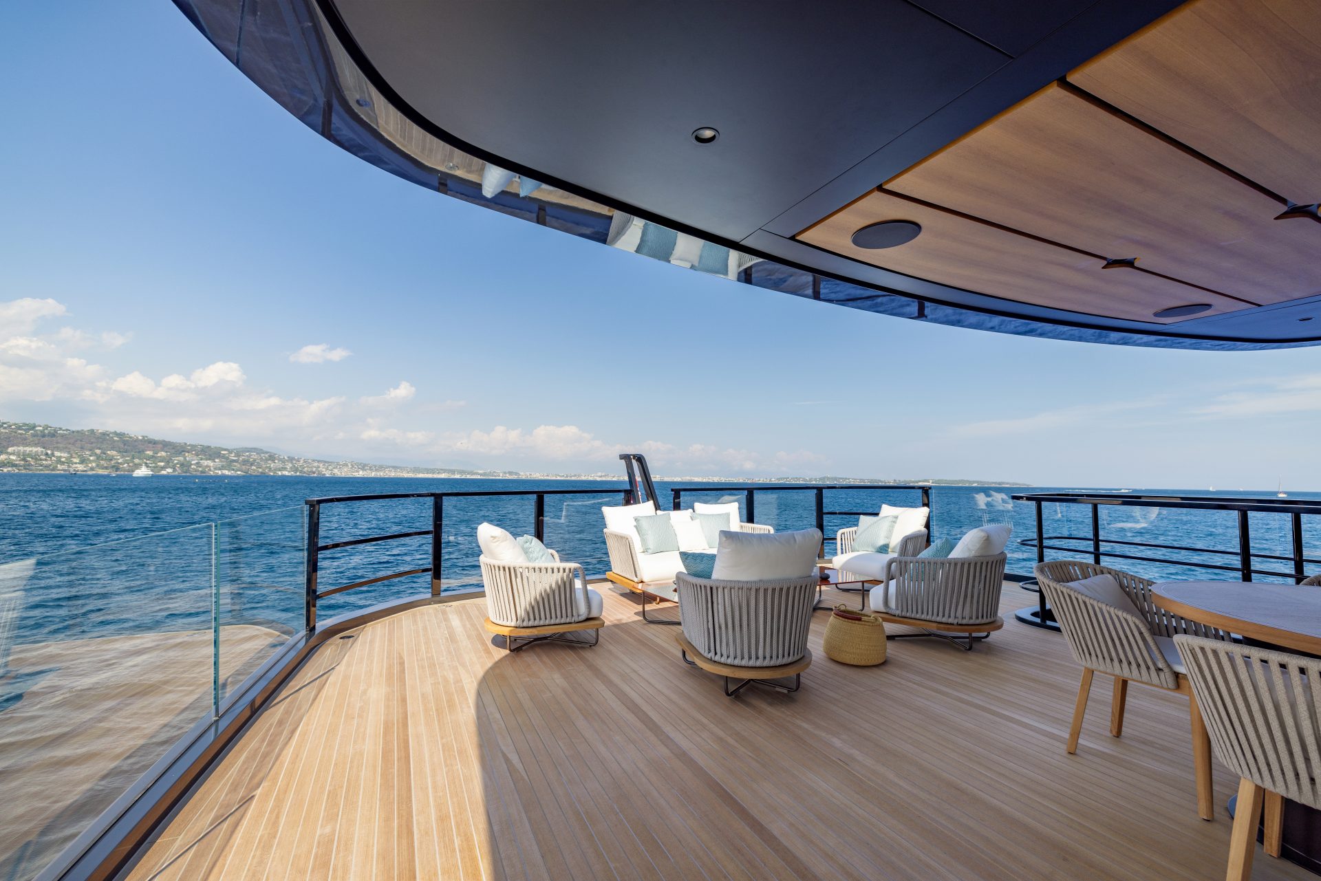 Luxurious deck of Mangusta yacht at sea.