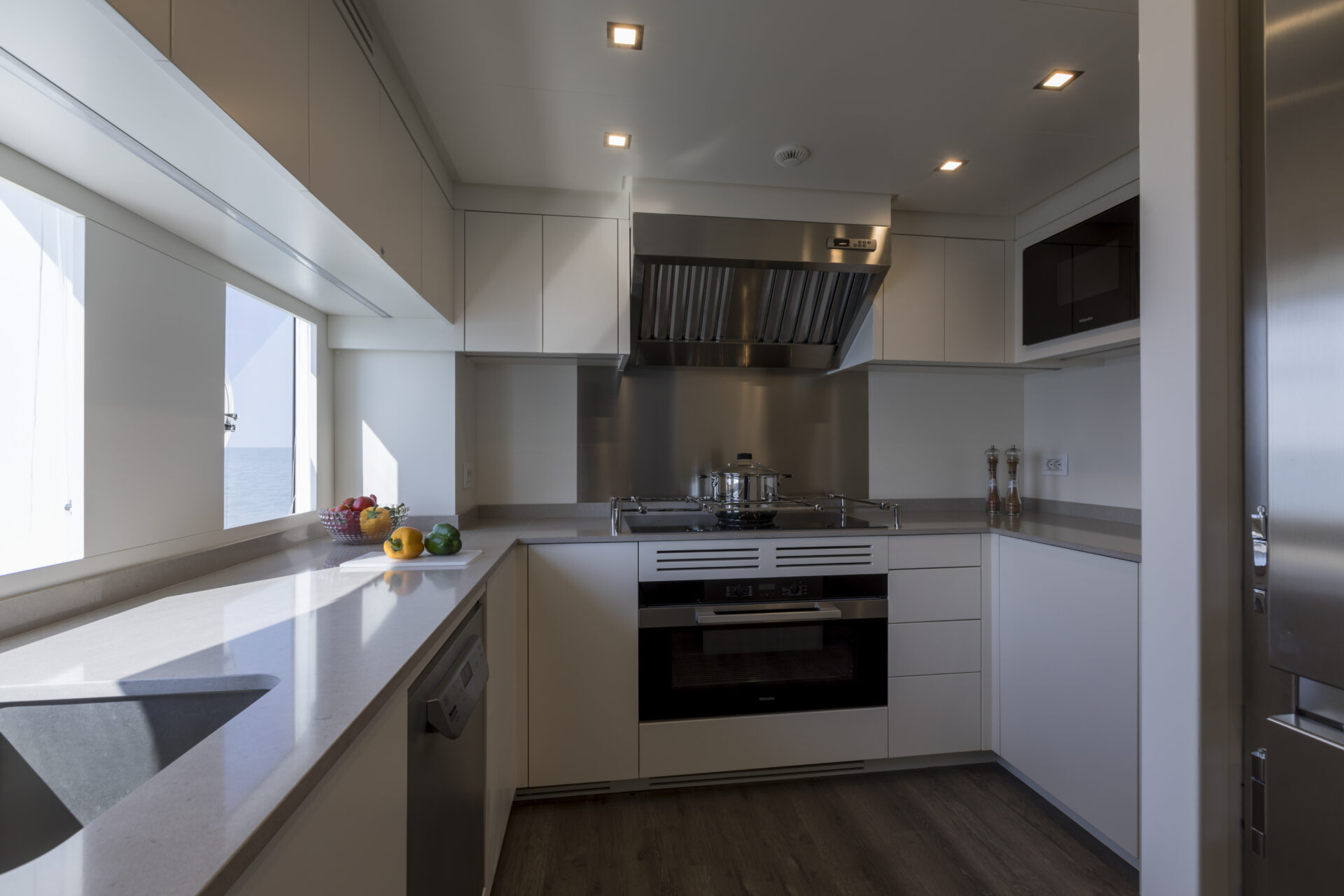 Sleek modern kitchen interior on luxury yacht.