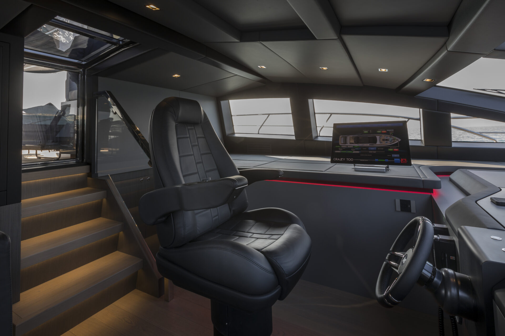Luxurious Mangusta Yachts helm with leather chair
