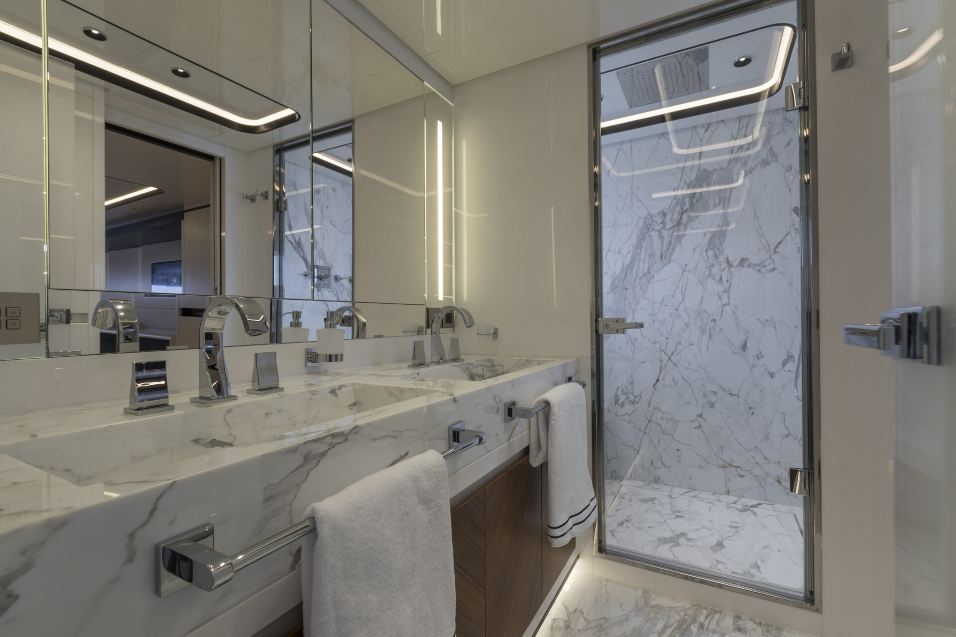 Luxury yacht bathroom with marble decor.