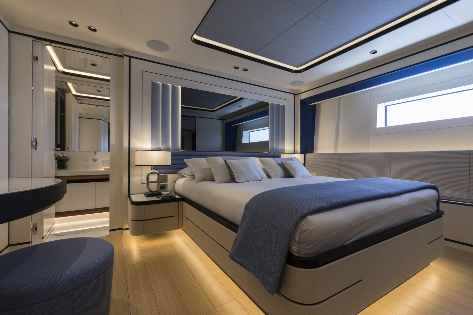 Luxury yacht bedroom with modern design.