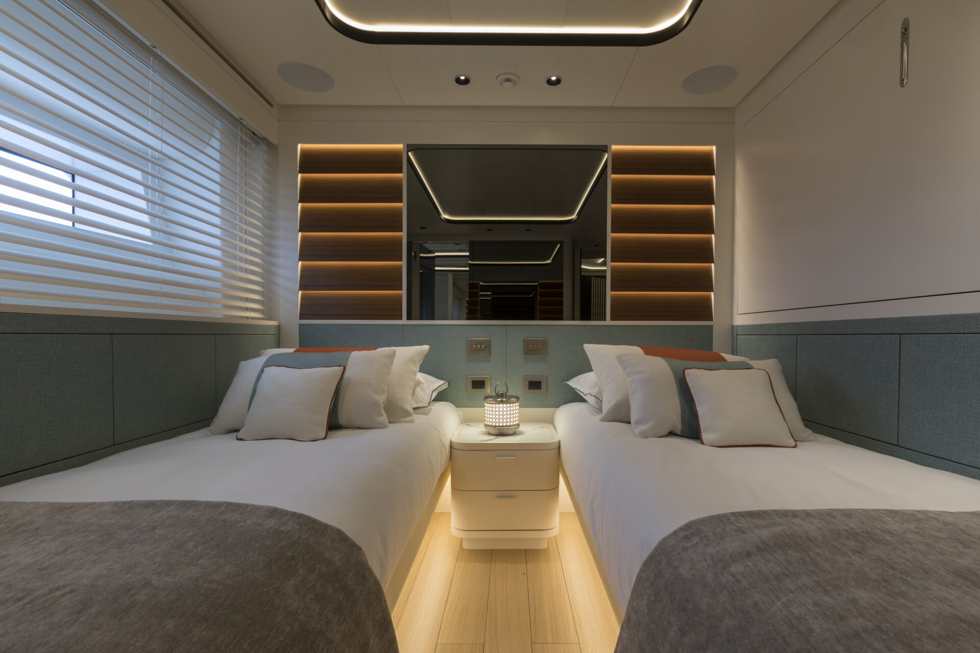 Luxury twin cabin in Mangusta Yacht interior.