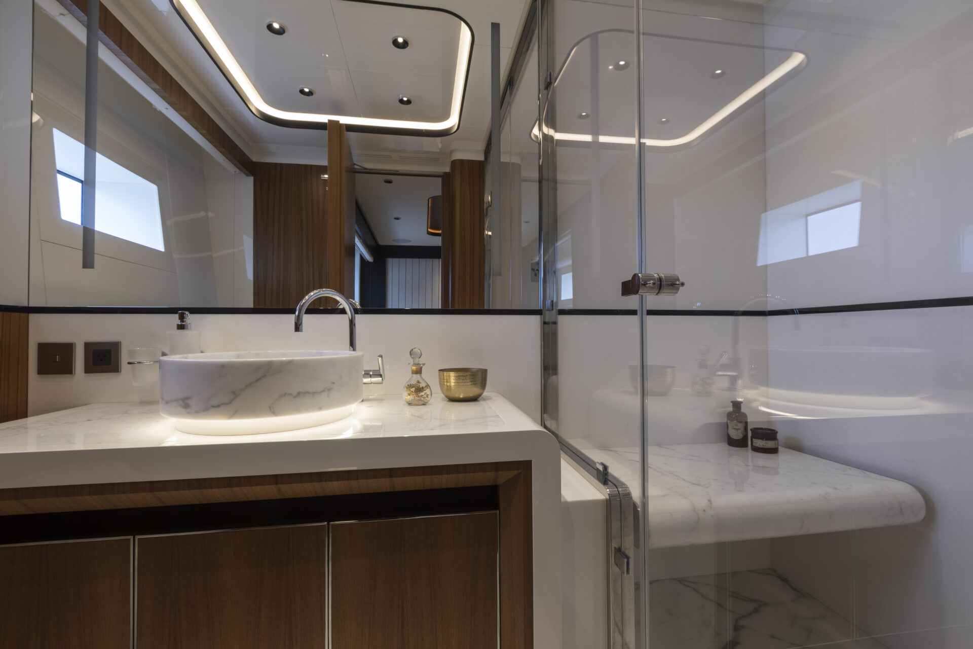 Luxurious yacht bathroom with marble sink.