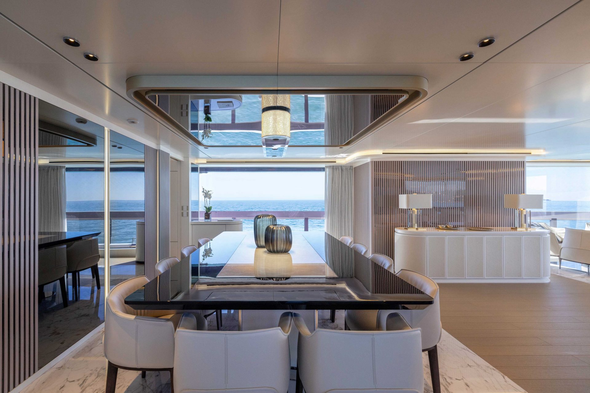 Sleek yacht dining area with ocean view