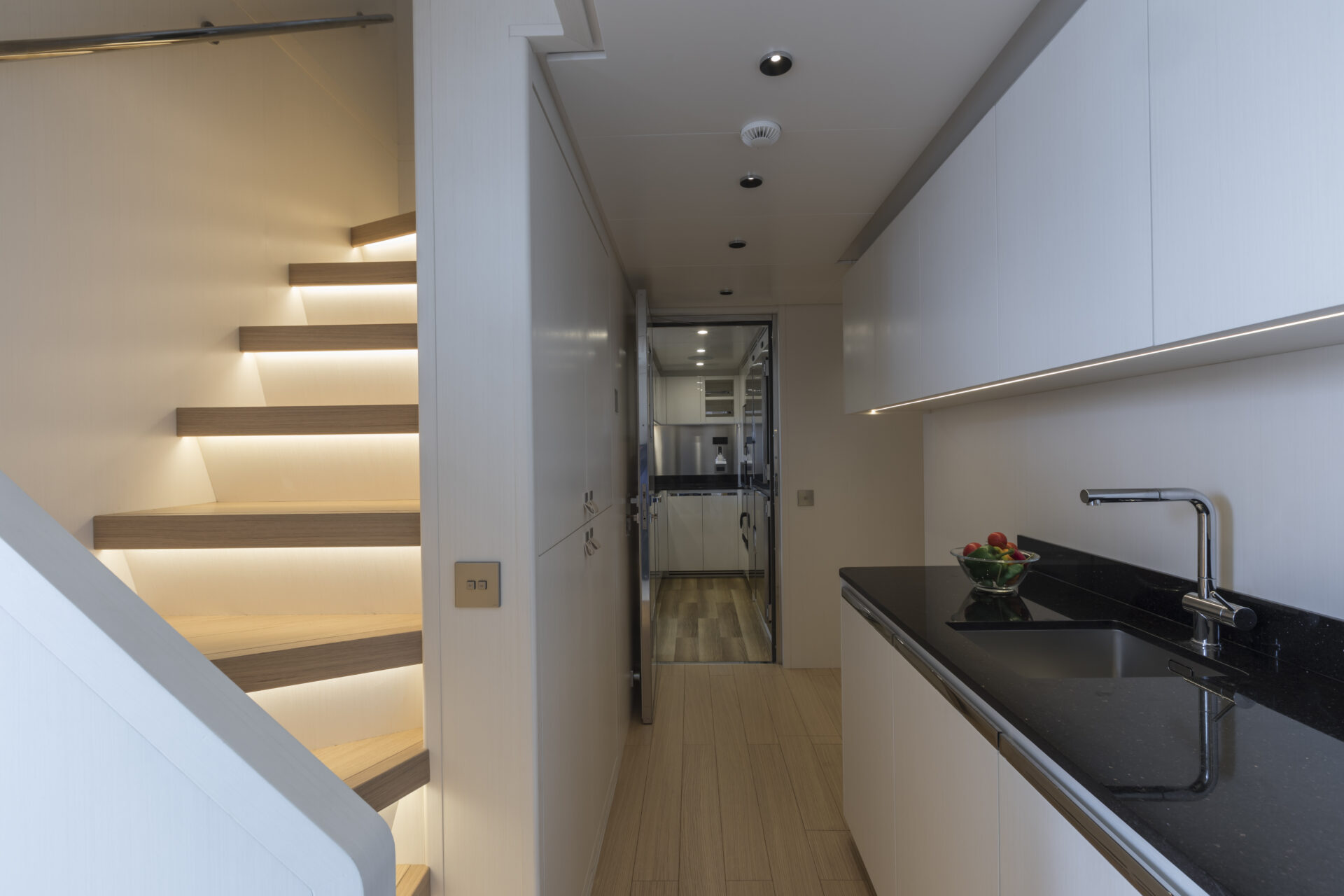 Galley and stairway on luxury Mangusta yacht
