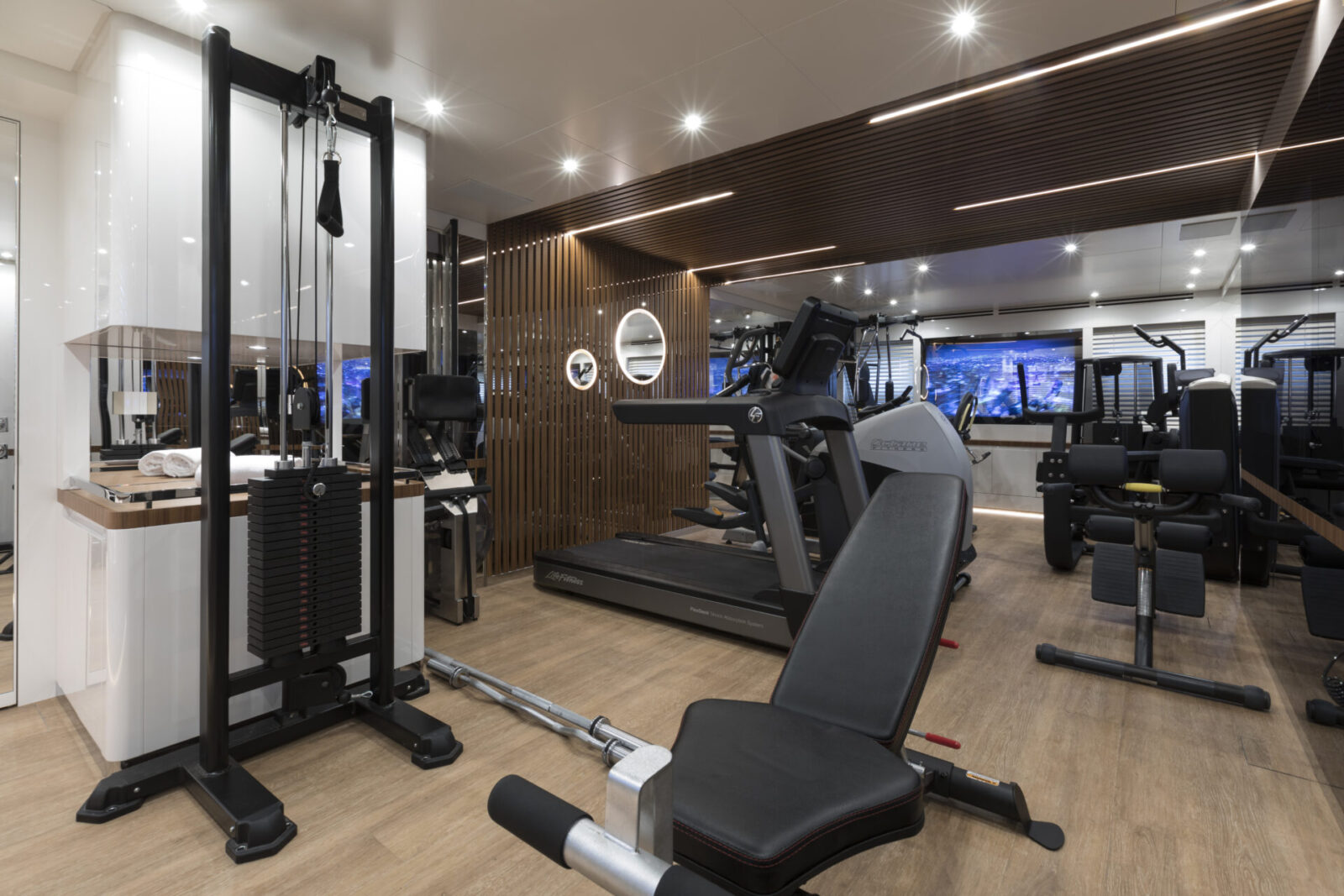 Luxury yacht gym with modern fitness equipment
