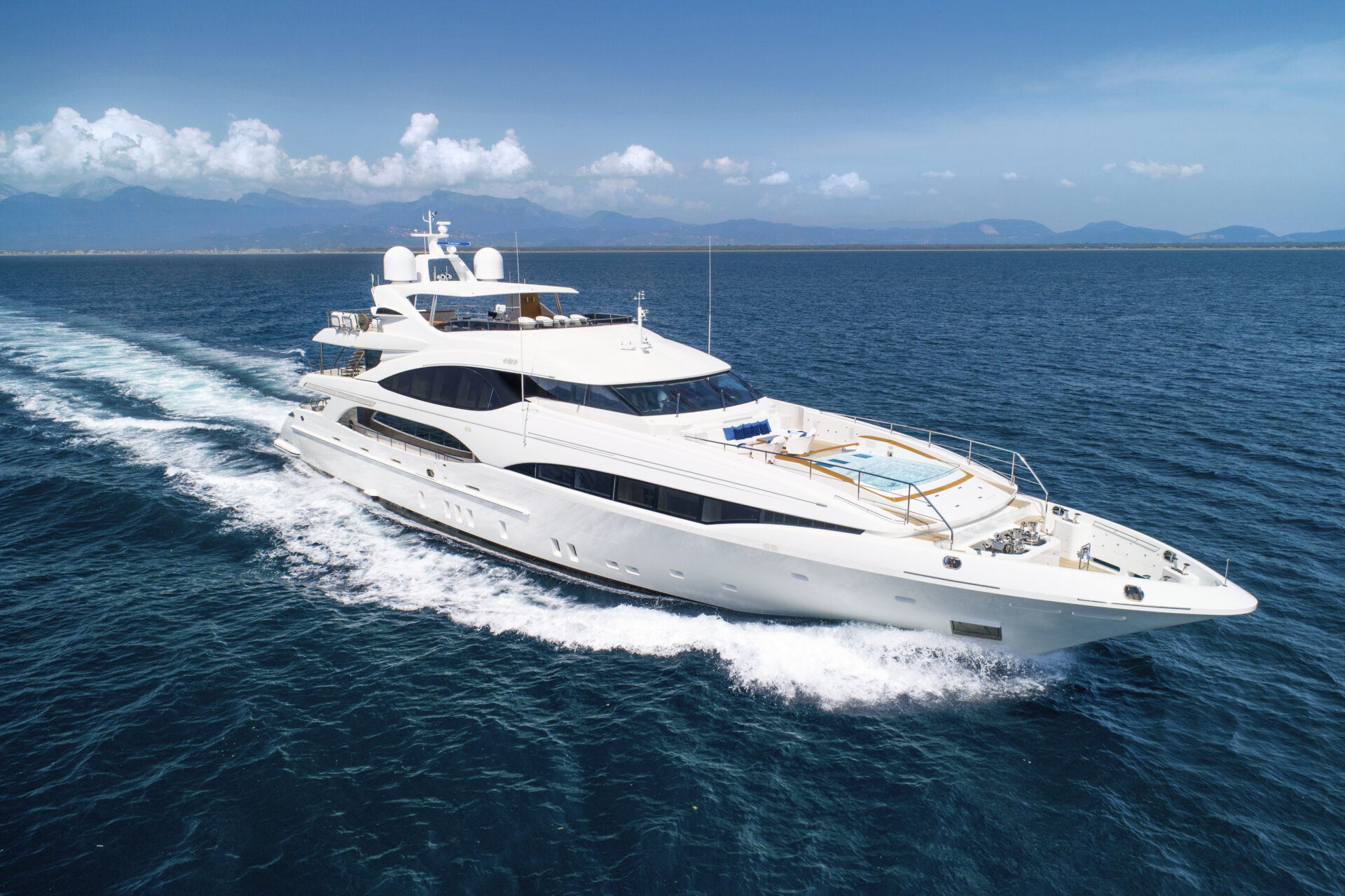 Mangusta yacht cruising on open sea