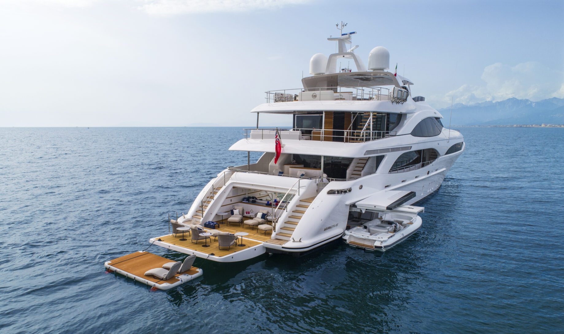 Luxury Mangusta Yacht on open sea.