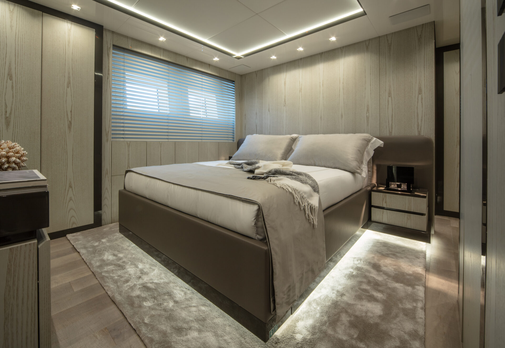 Elegant yacht bedroom with modern lighting