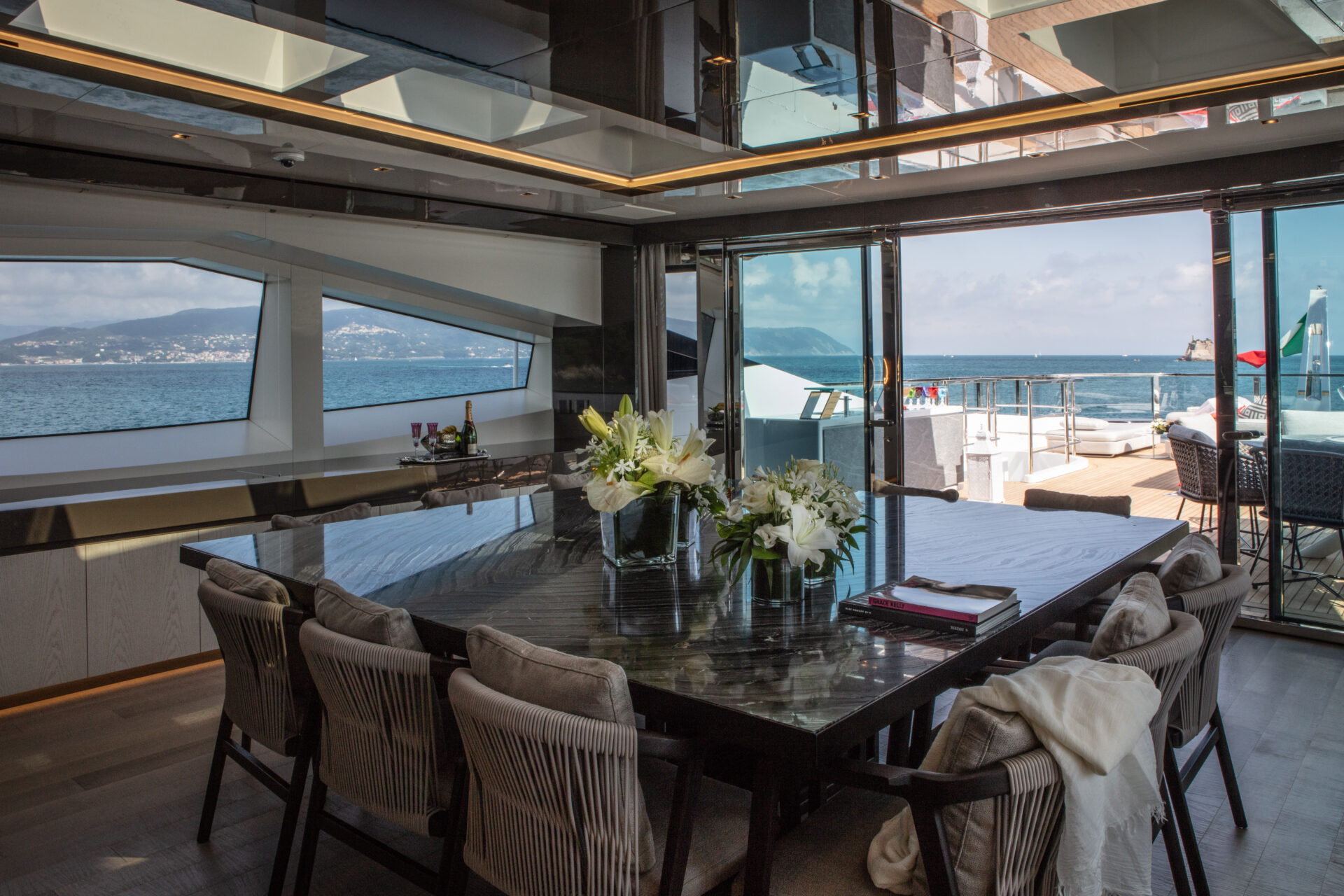 Luxurious dining space on Mangusta yacht.