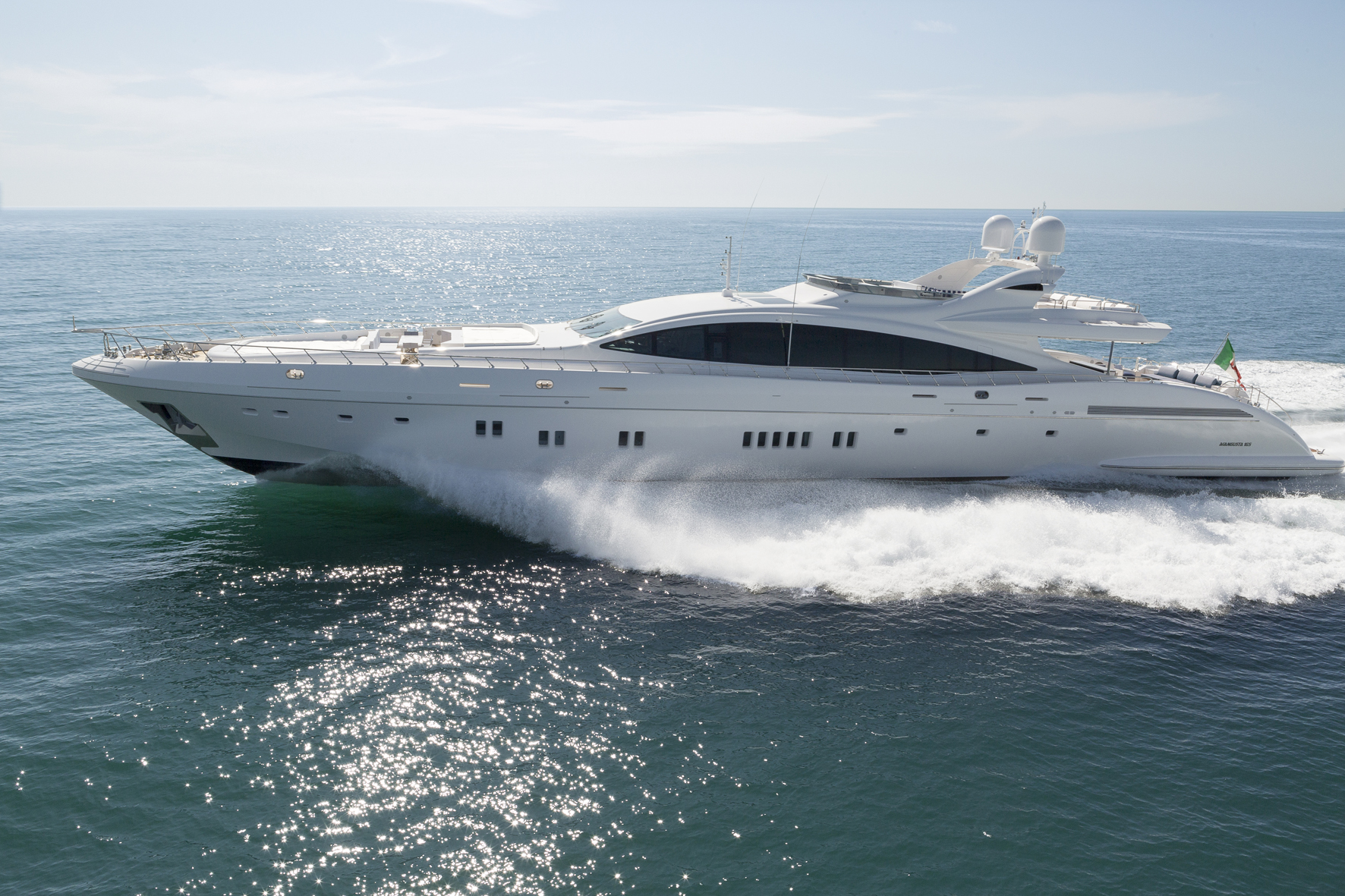 Mangusta yacht cruising swiftly on open sea