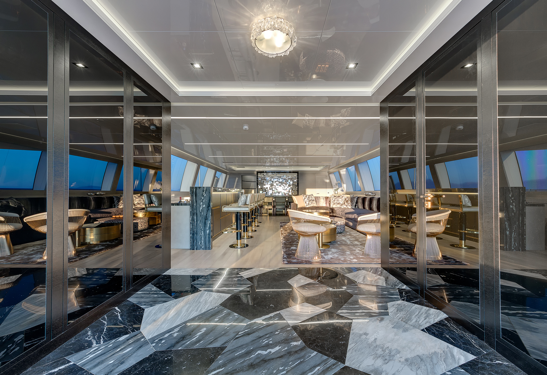 Luxurious interior of Mangusta yacht lounge area.
