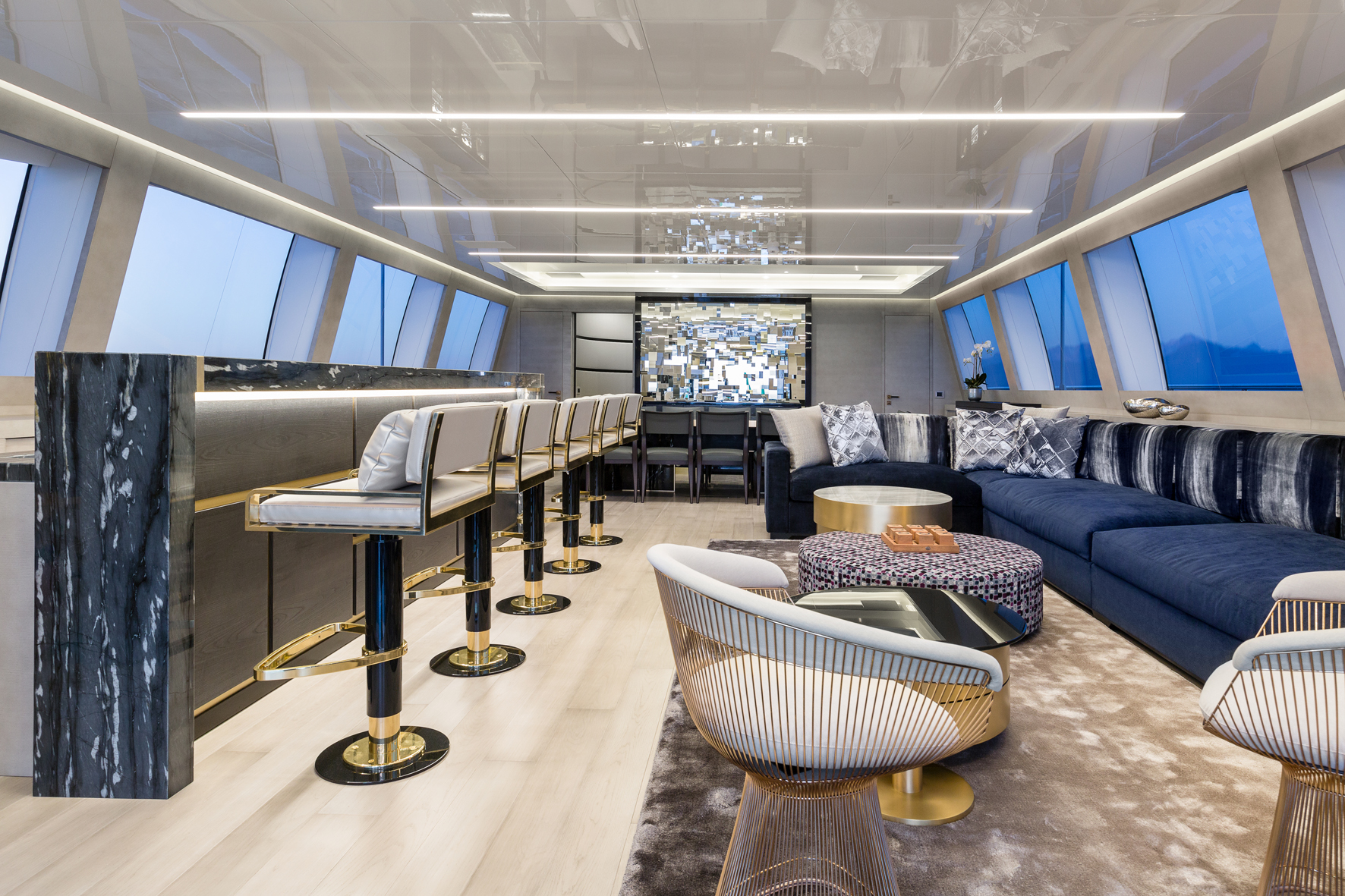 Luxurious yacht interior with bar and lounge seating