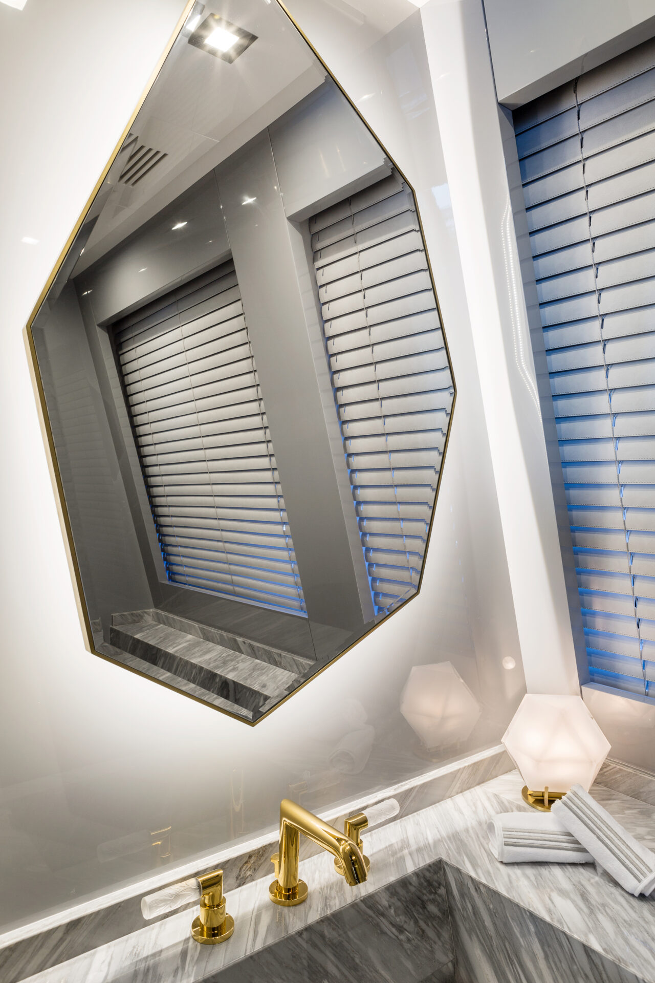 Luxury yacht bathroom with gold fixtures
