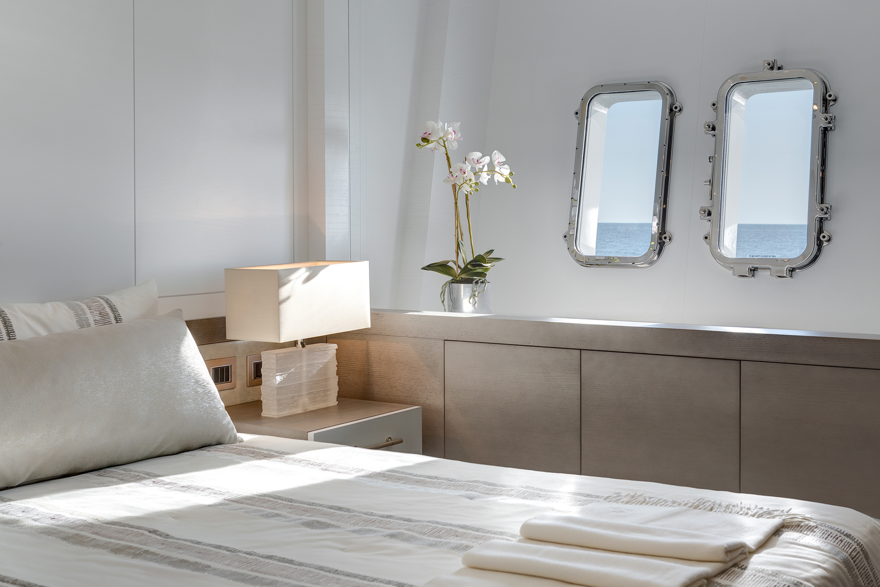 Luxurious yacht cabin with sea view windows