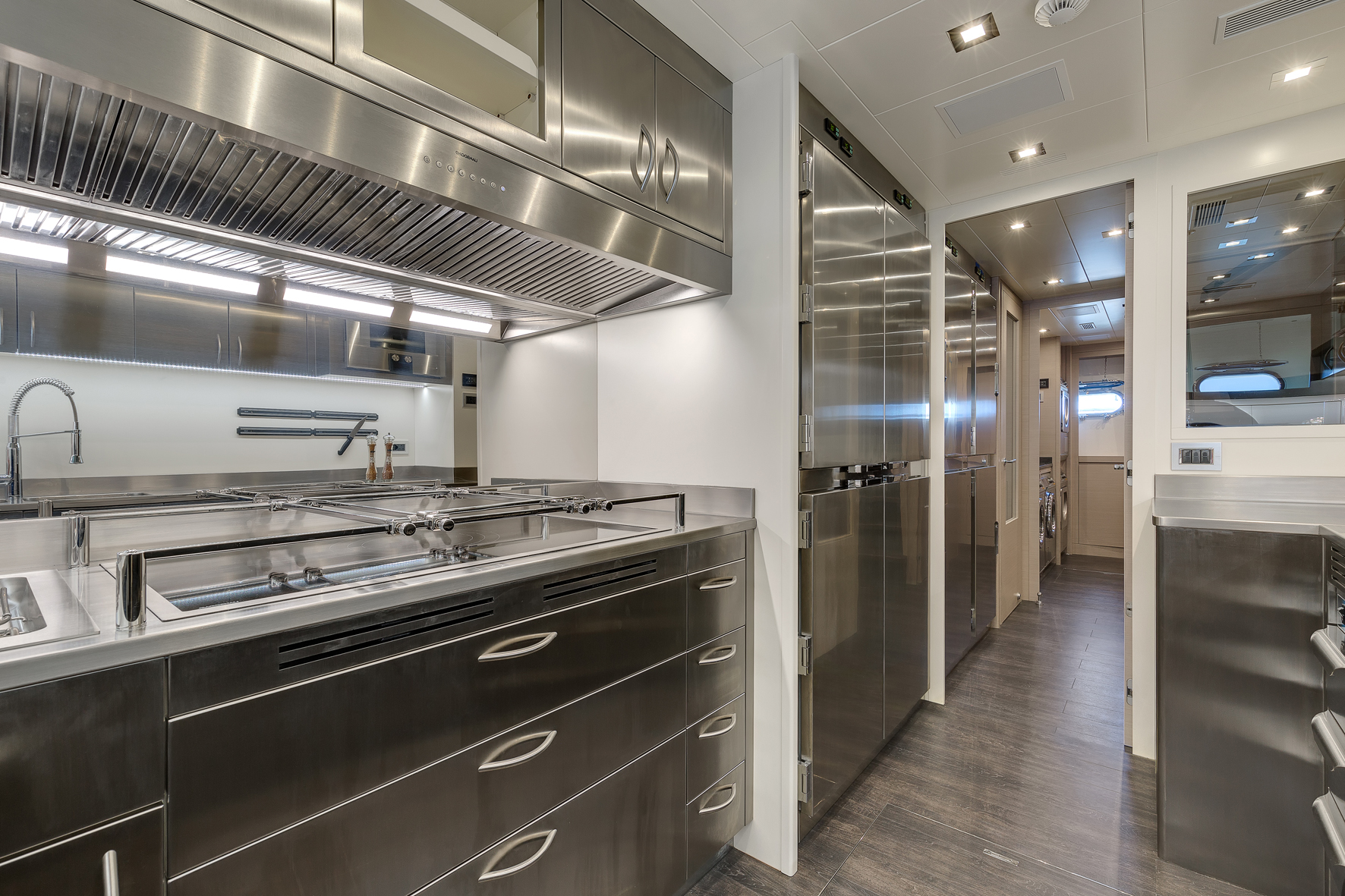 Luxurious yacht kitchen with stainless steel design.