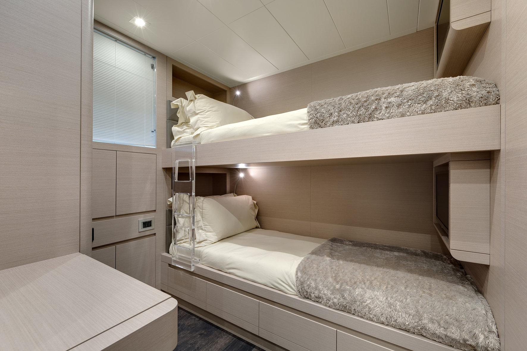 Luxury yacht interior with modern bunk beds