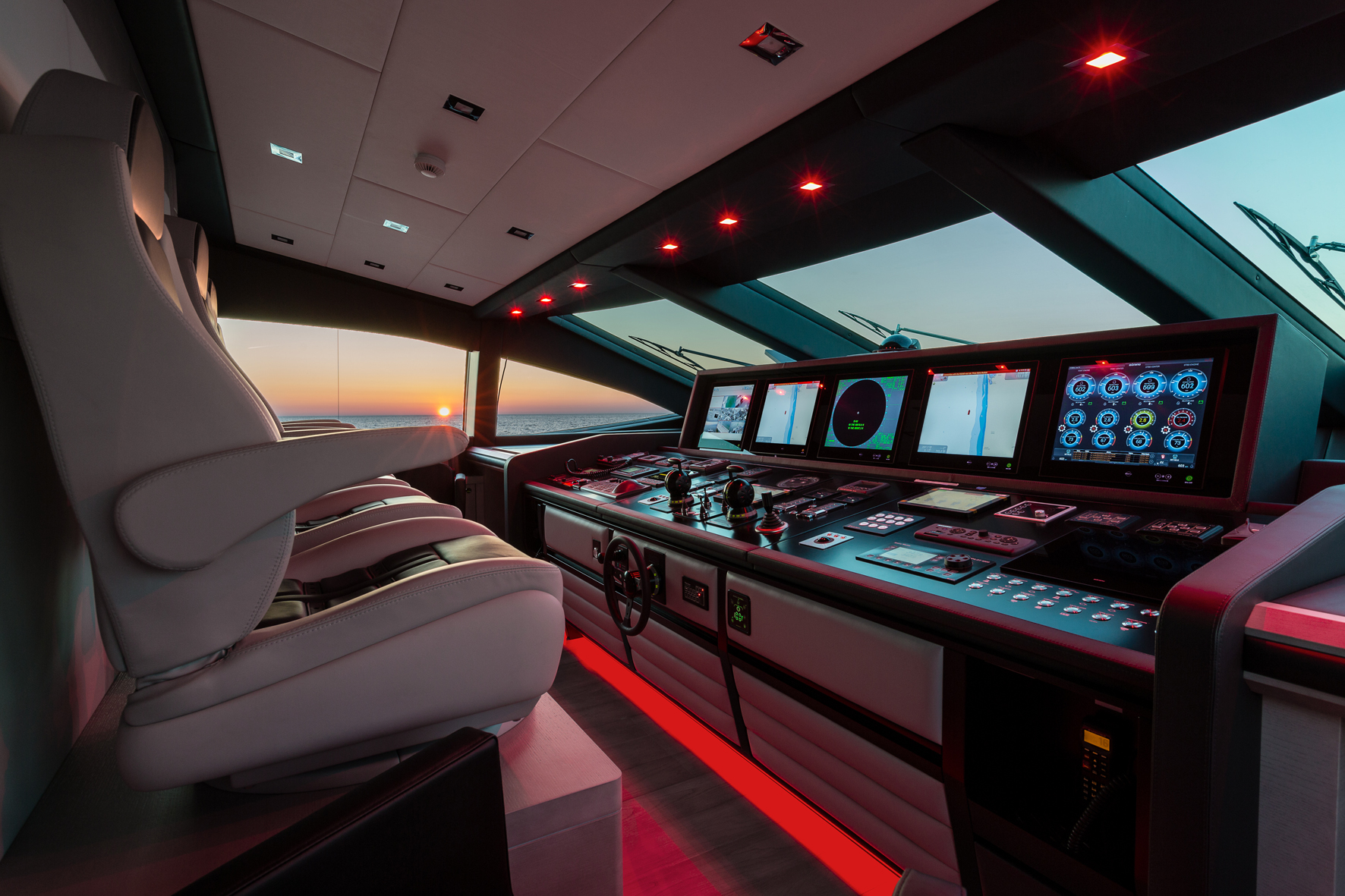 Luxurious Mangusta Yachts helm at sunset
