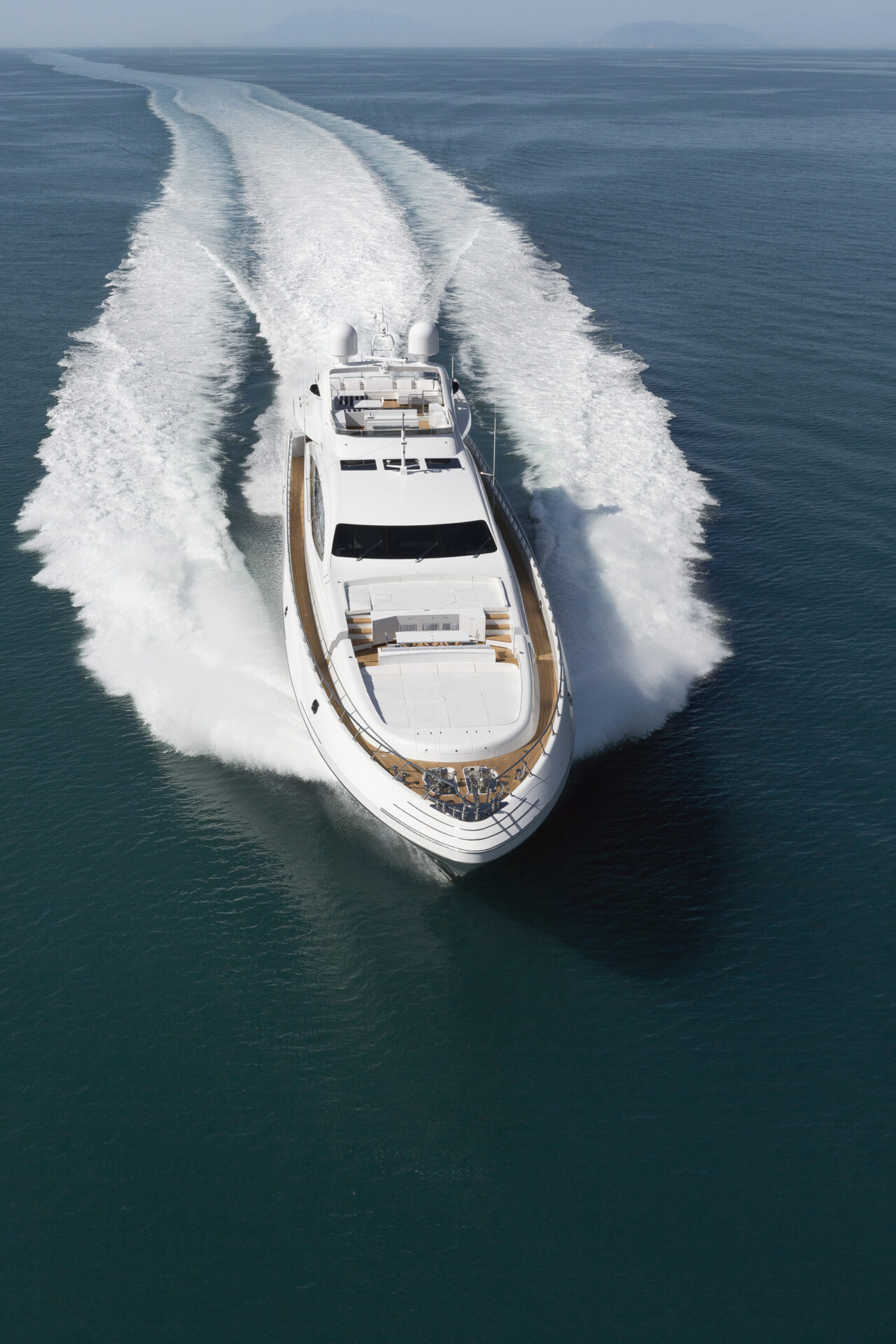 Luxurious Mangusta yacht cruising at high speed