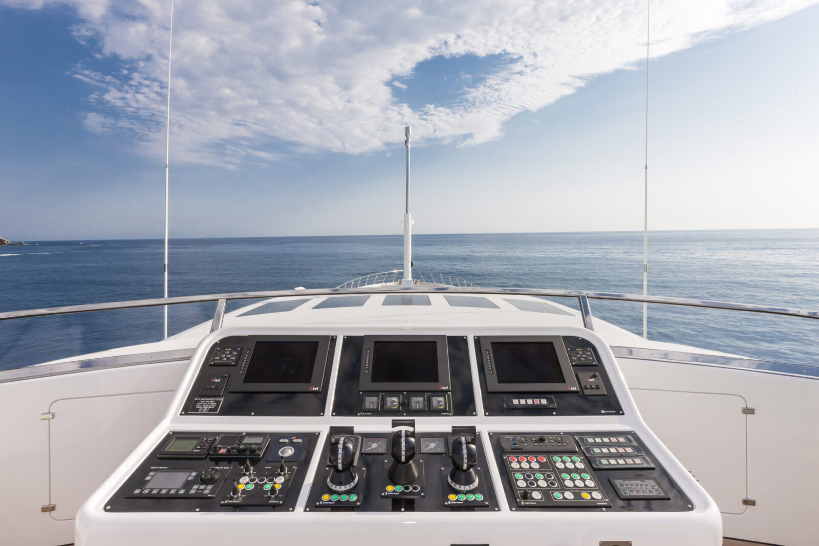 Yacht helm with ocean view, Mangusta Yachts.