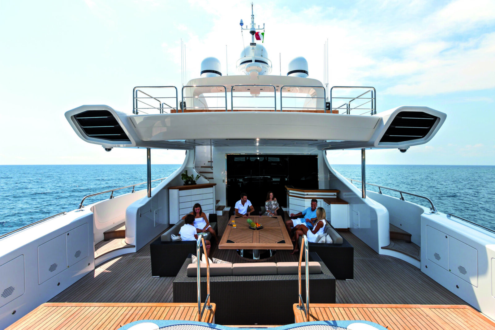 Mangusta Yachts luxury deck with guests relaxing