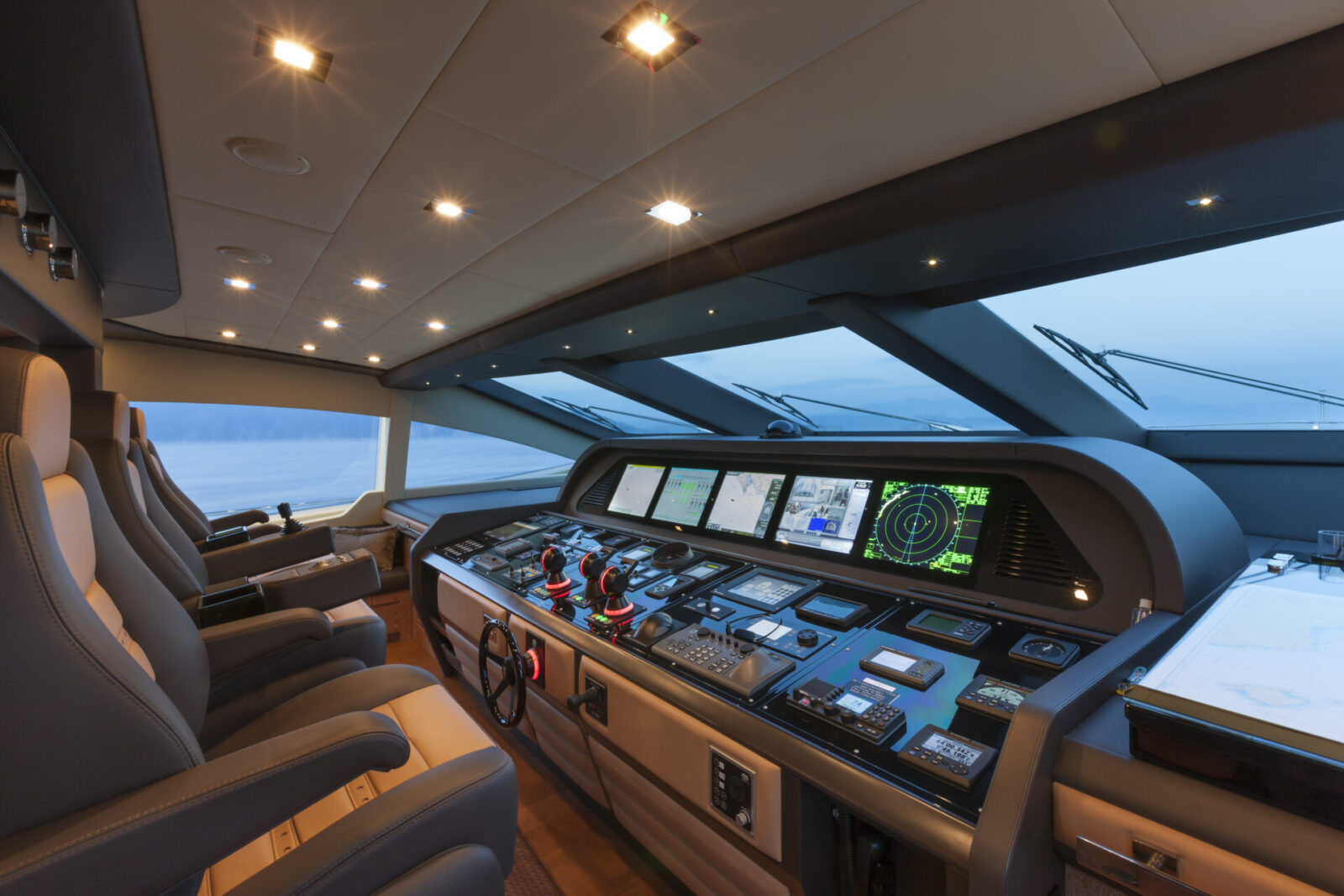 Luxurious yacht cockpit with advanced navigation systems.