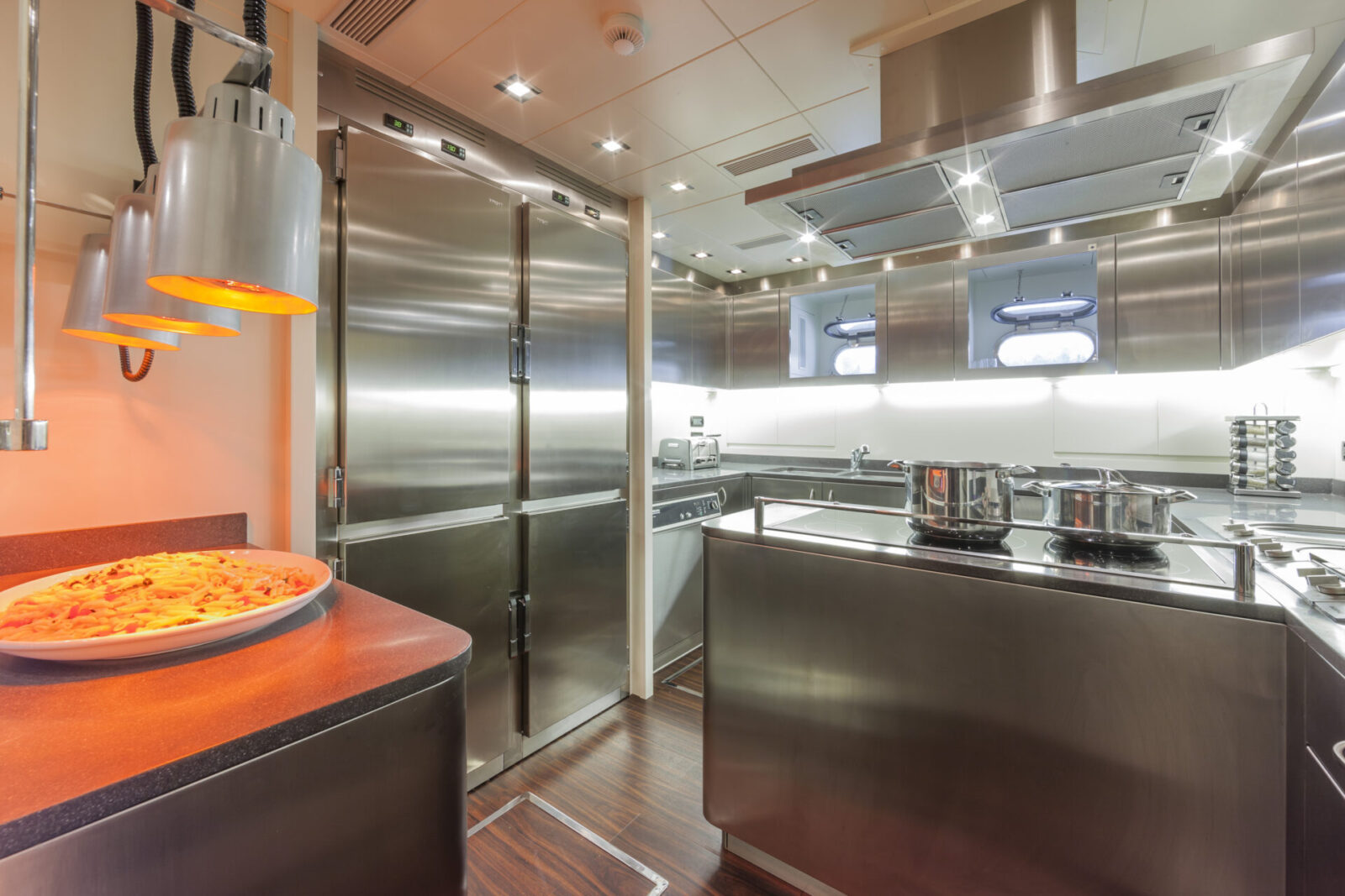 Modern galley kitchen on luxury Mangusta yacht