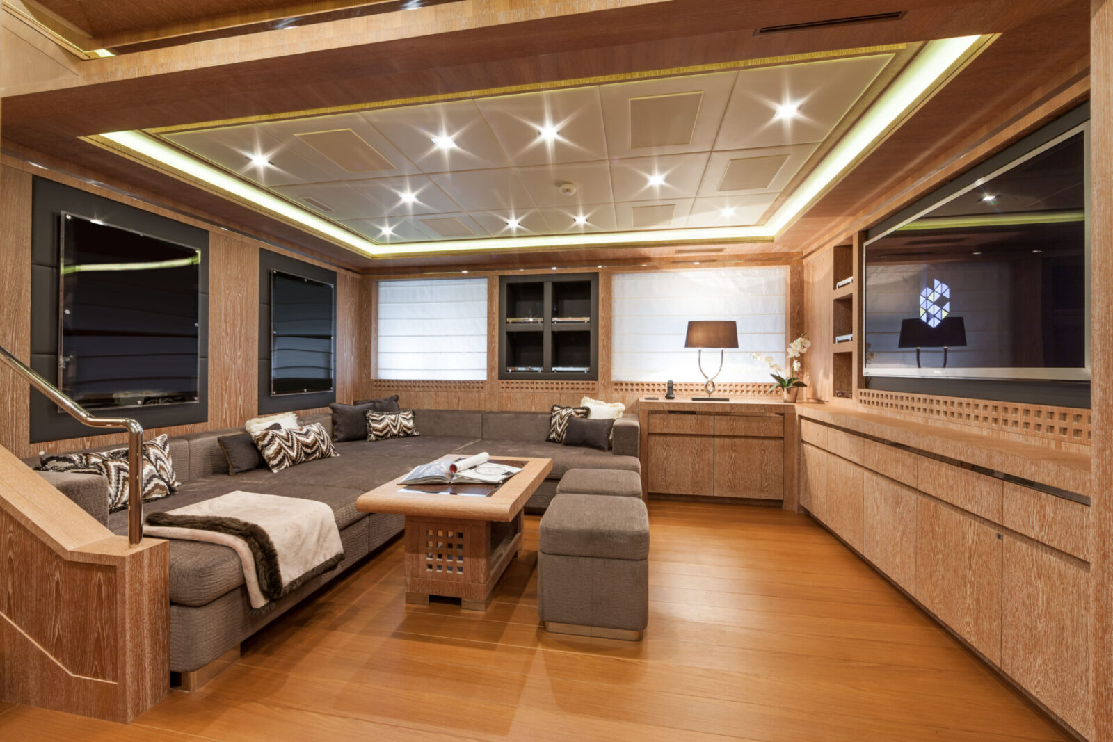Luxurious lounge area on Mangusta Yacht interior.