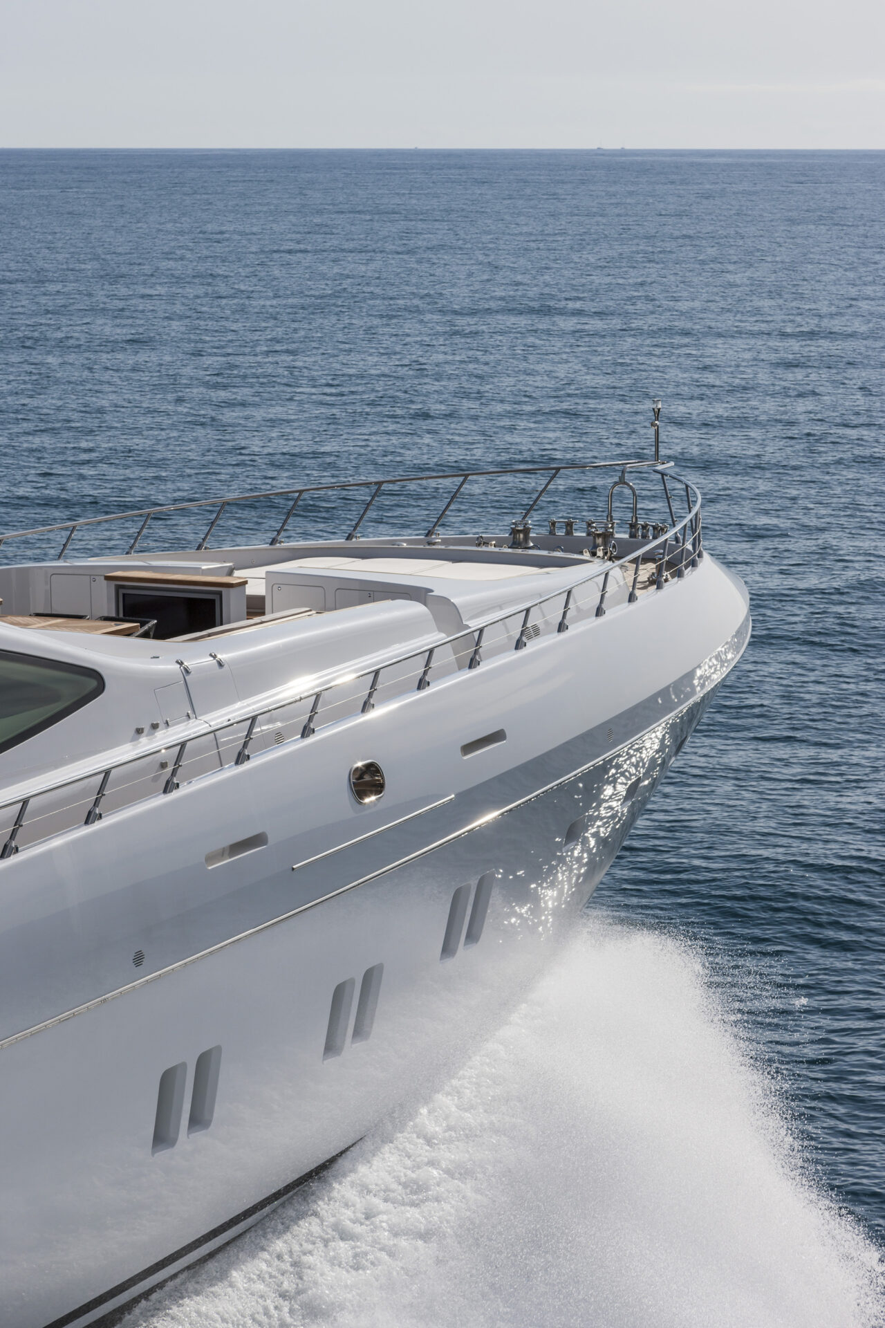 Mangusta yacht cruising on open ocean waters.