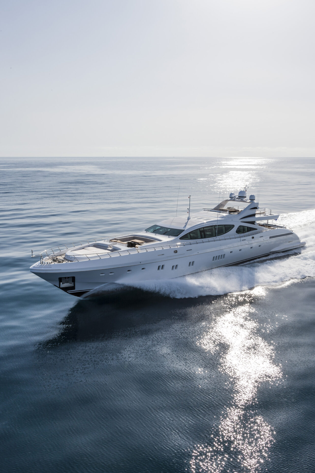Mangusta yacht gliding on open sea.
