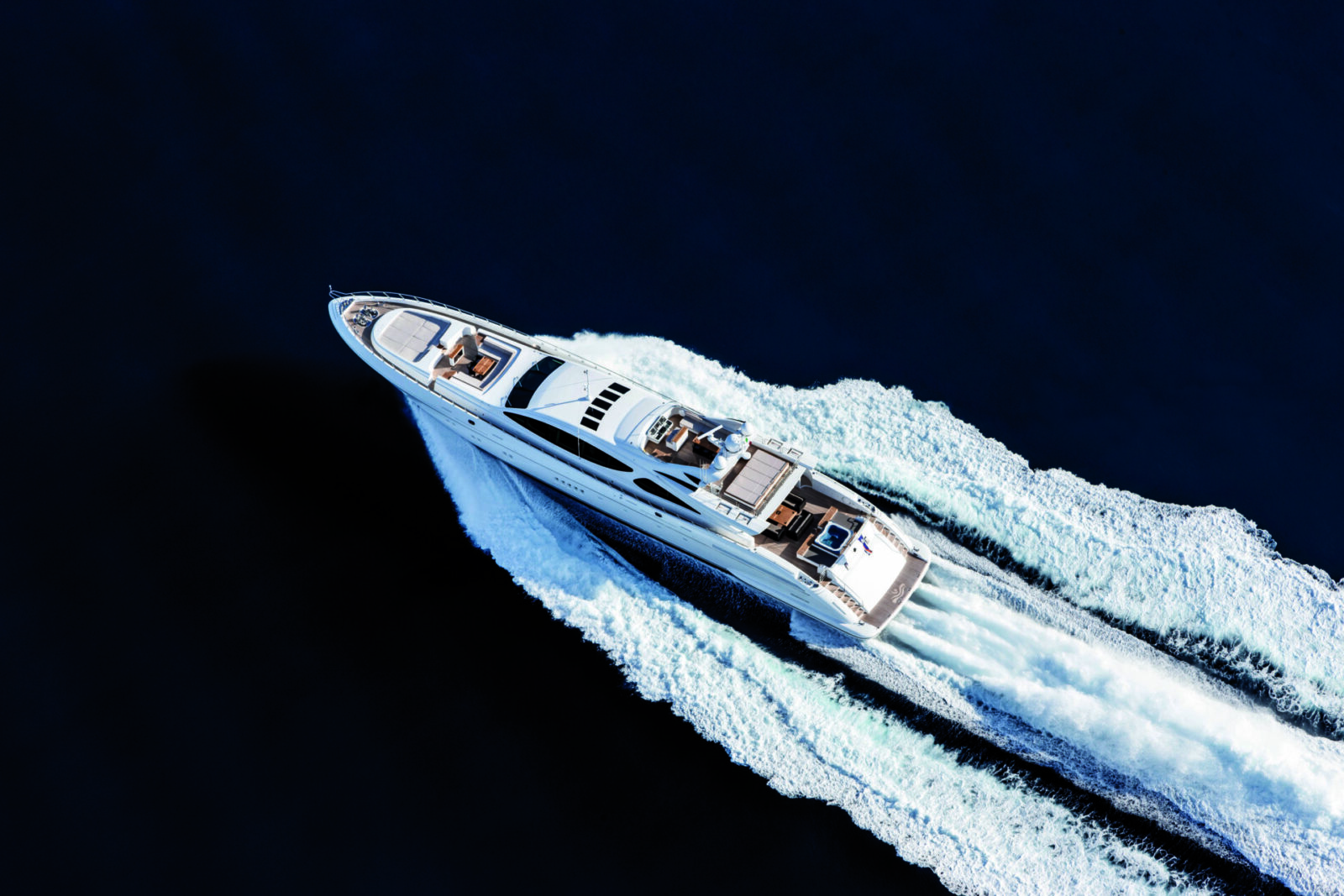 Mangusta yacht cruising in open water