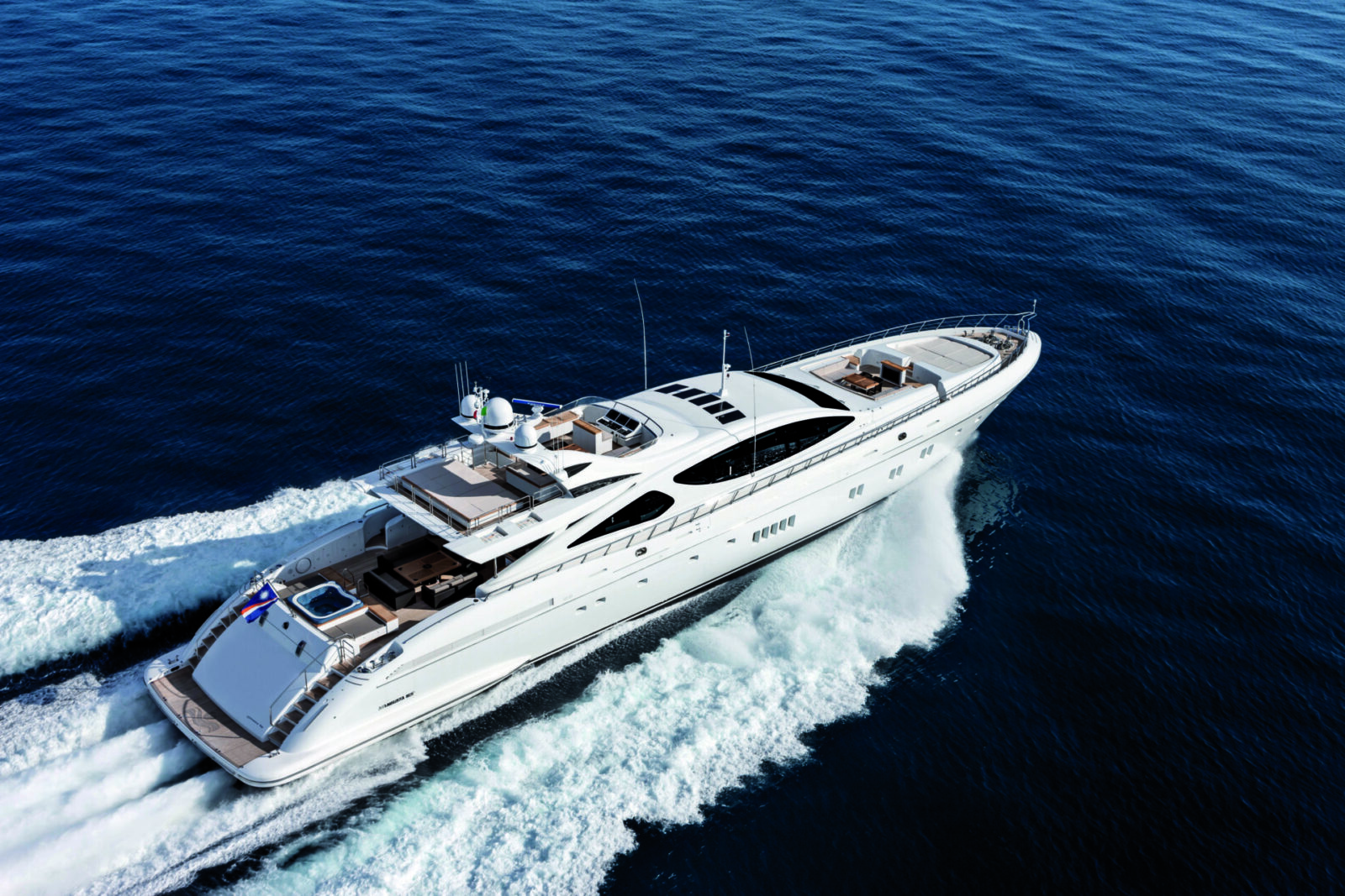 Mangusta yacht cruising on open sea