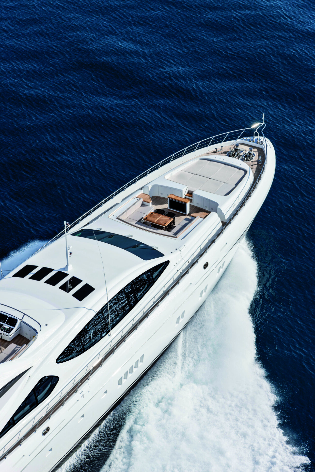 Mangusta yacht cruising on open sea.