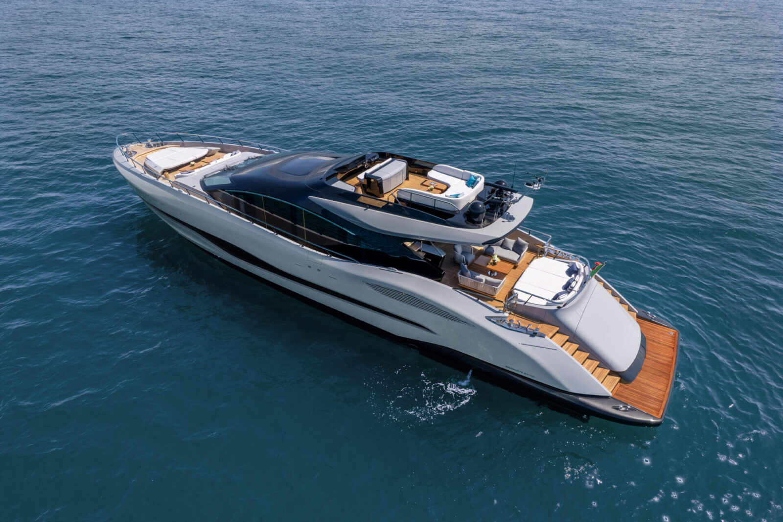 Mangusta luxury yacht cruising on open sea.