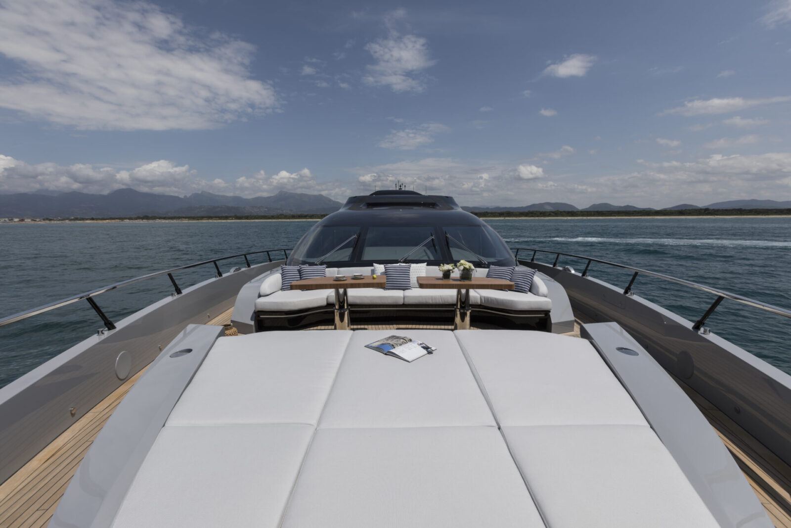 Luxury deck view on Mangusta yacht cruising.