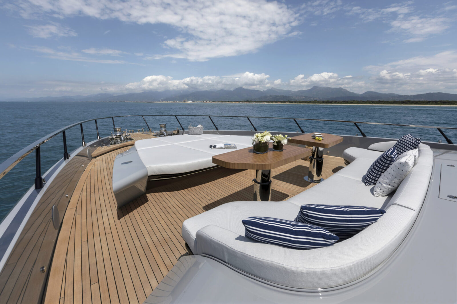 Luxurious deck lounging on Mangusta yacht.