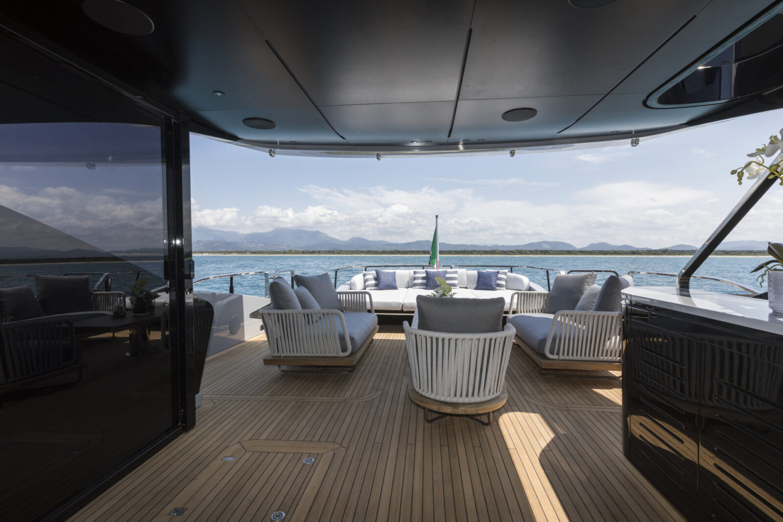 Luxurious deck seating on Mangusta Yacht with sea view