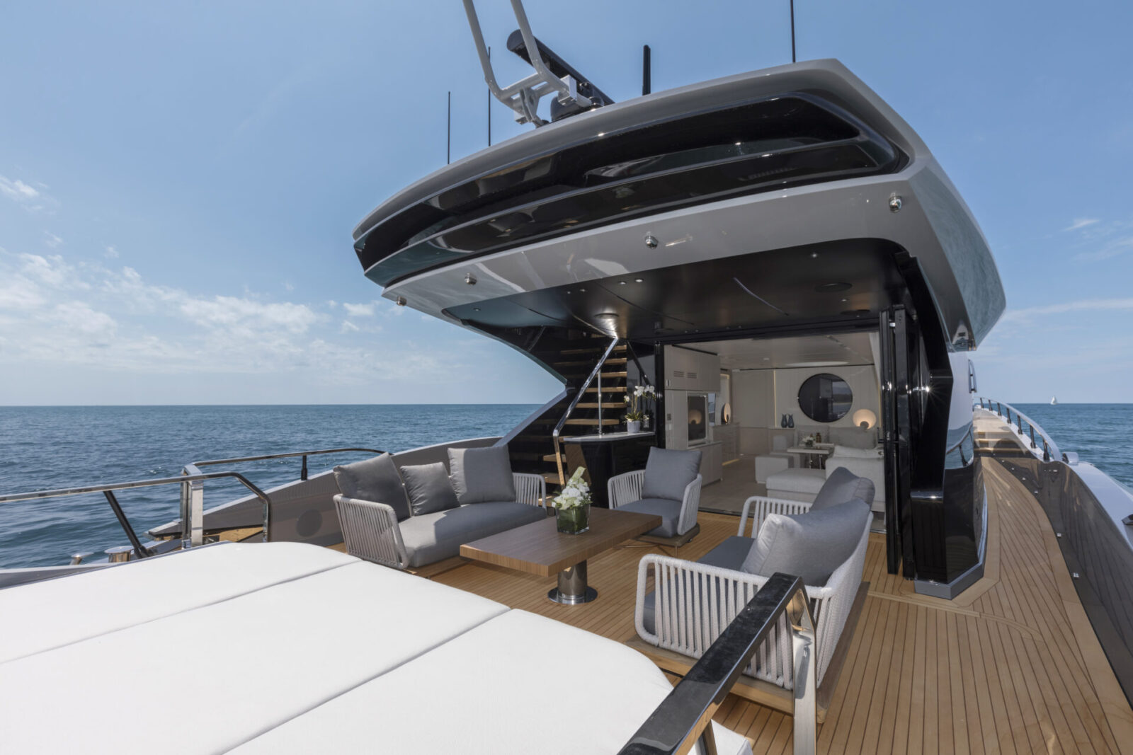 Luxurious Mangusta yacht deck with sea view.