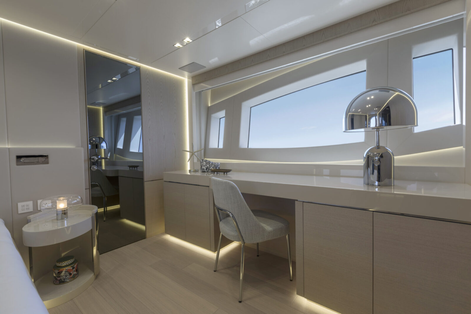 Luxurious yacht interior with sleek desk and window