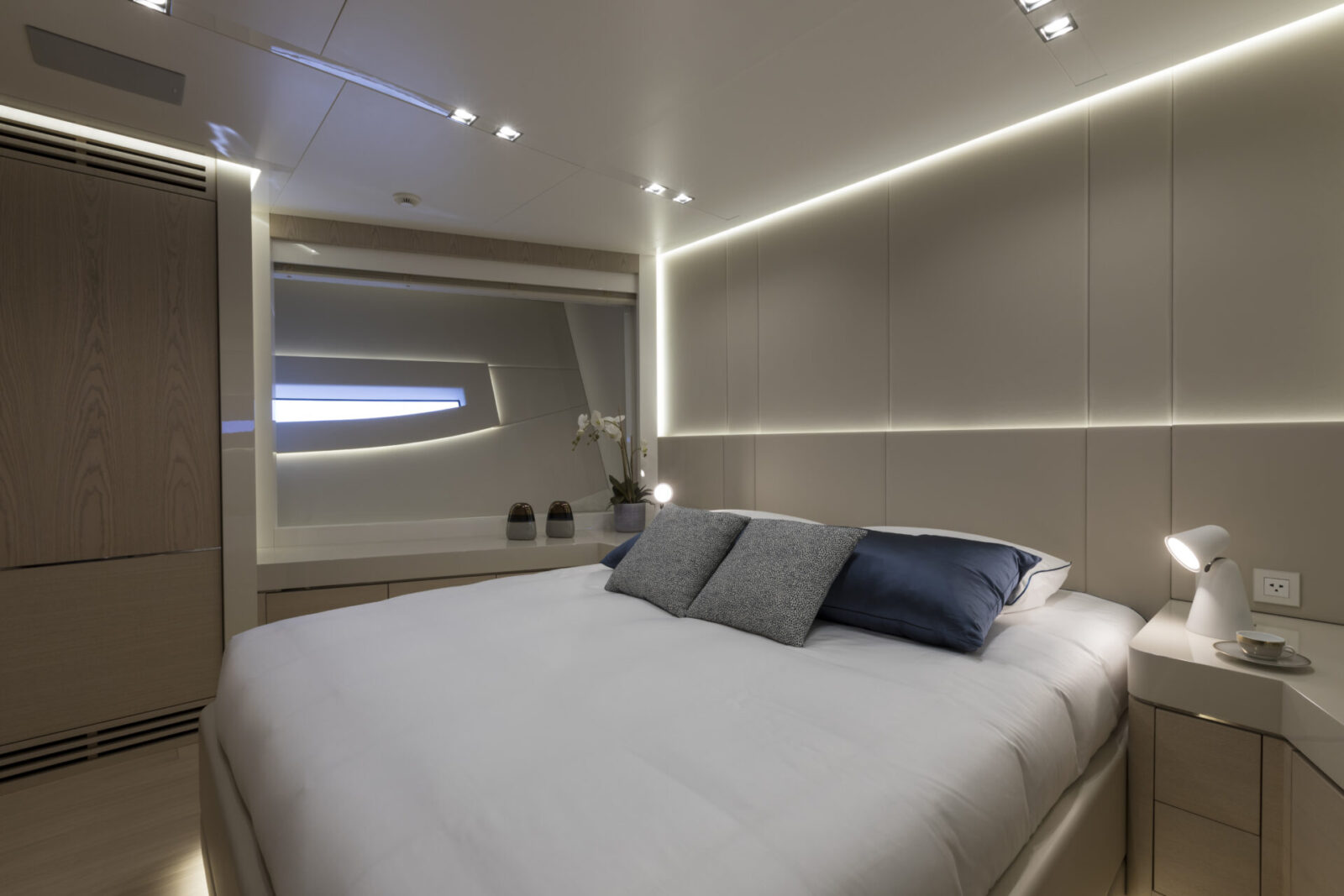 Luxurious bedroom interior on Mangusta yacht