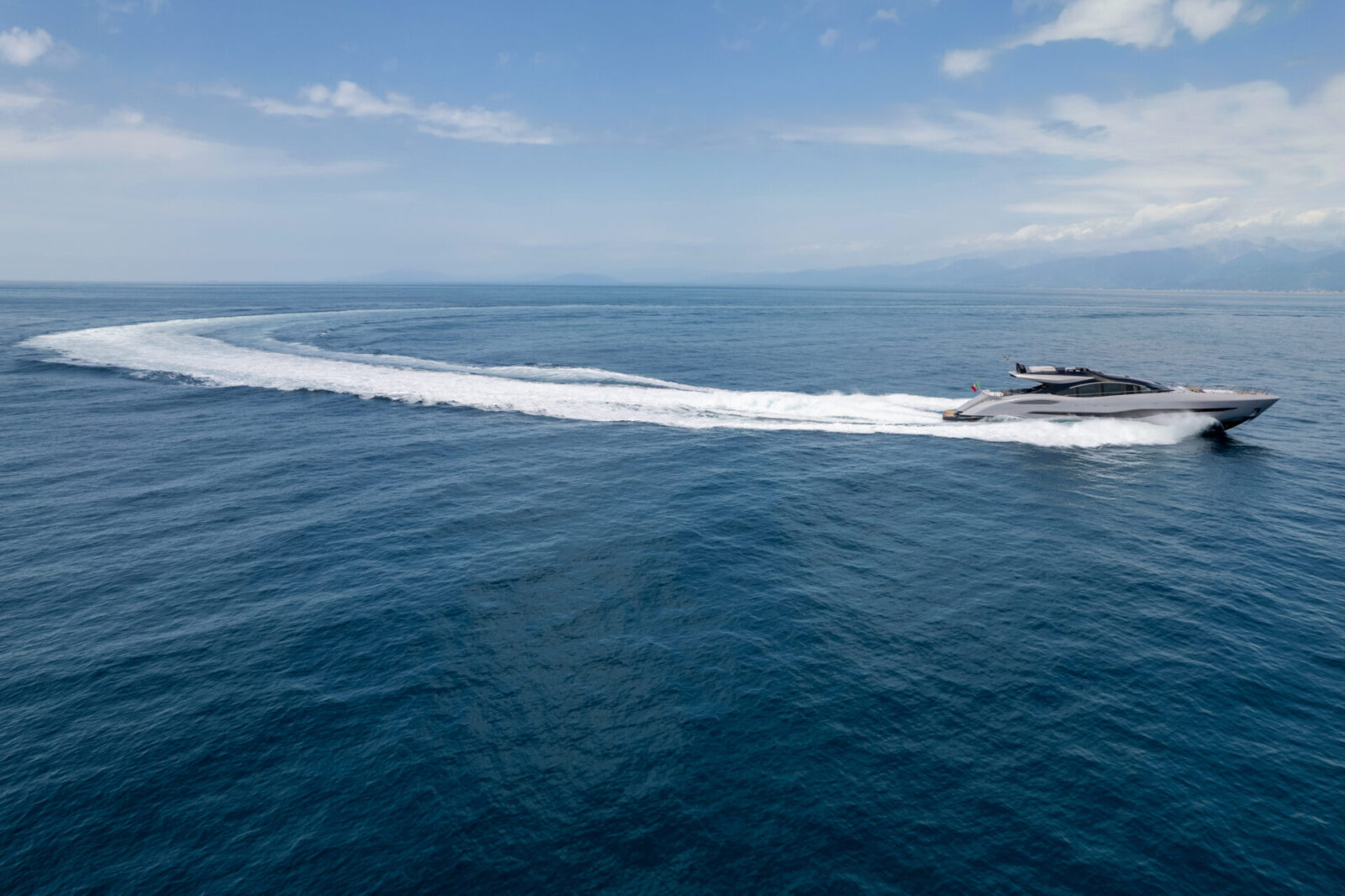 Mangusta yacht cruising on open sea