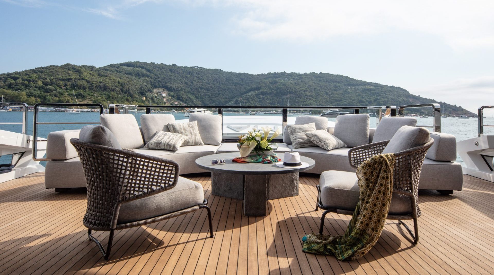 Luxury yacht deck with seating and sea view